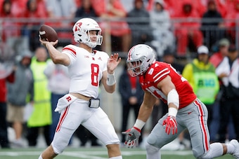 COLUMBUS, OH - SEPTEMBER 08: Artur Sitkowski #8 of the Rutgers Scarlet Knights throws a pass while under pressure from Nick Bosa #97 of the Ohio State Buckeyes in the first quarter of the game at Ohio Stadium on September 8, 2018 in Columbus, Ohio. (Photo