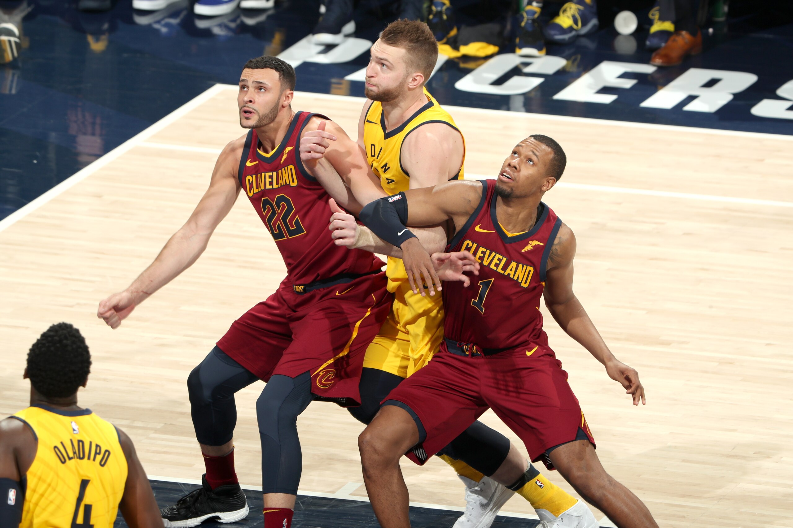 INDIANAPOLIS, IN - APRIL 20:  Larry Nance Jr. #22 and Rodney Hood #1 of the Cleveland Cavaliers box out Domantas Sabonis #11 of the Indiana Pacers in Game Three of Round One of the 2018 NBA Playoffs on April 20, 2018 at Bankers Life Fieldhouse in Indianap