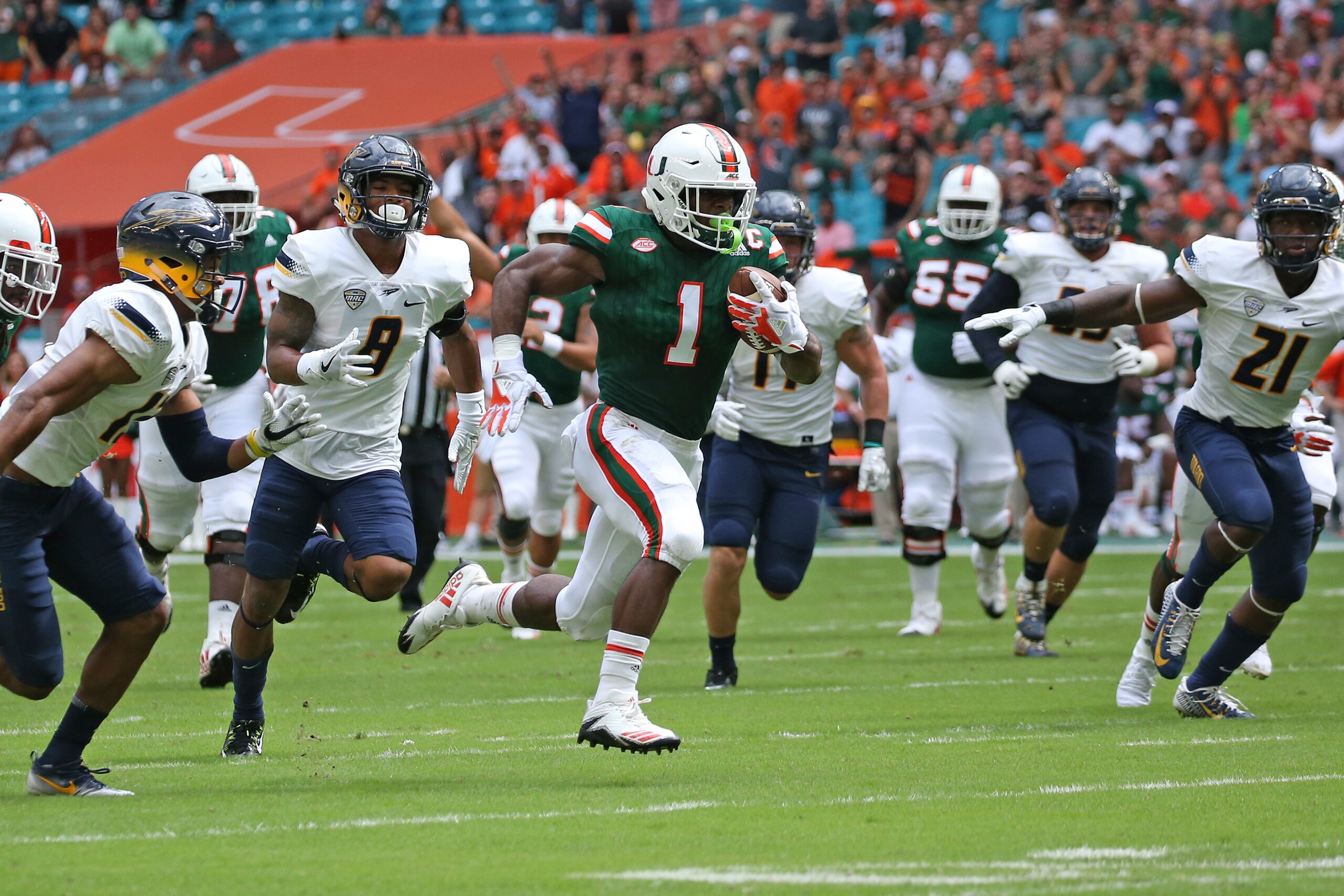 MIAMI GARDENS, FL - SEPTEMBER 23: Mark Walton #1 of the Miami Hurricanes runs with the ball against the Toledo Rockets on September 23, 2017 at Hard Rock Stadium in Miami Gardens, Florida. Miami defeated Toledo 52-30. (Photo by Joel Auerbach/Getty Images)