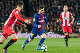 BARCELONA, SPAIN - FEBRUARY 24: Lionel Andres Messi of FC Barcelona (C) in action during the La Liga 2017-18 match between FC Barcelona and Girona FC at Camp Nou on 24 February 2018 in Barcelona, Spain. (Photo by Power Sport Images/Getty Images)