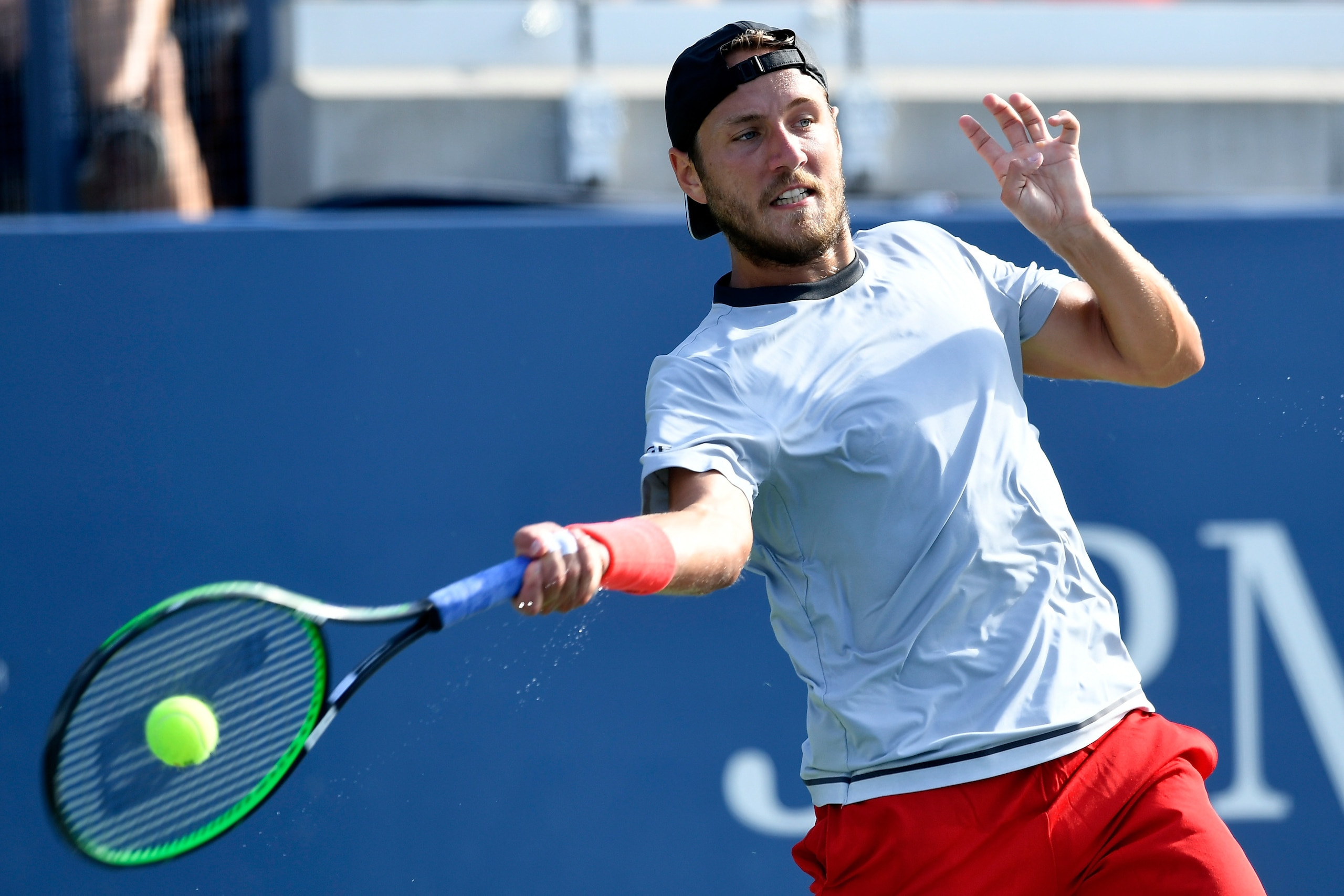 NEW YORK, NY - SEPTEMBER 01:  Lucas Pouille of France returns the ball during the men's singles third round match againsgt Paoalo Sousa of Portugal on Day Six of the 2018 US Open at the USTA Billie Jean King National Tennis Center on September 1, 2018 in 