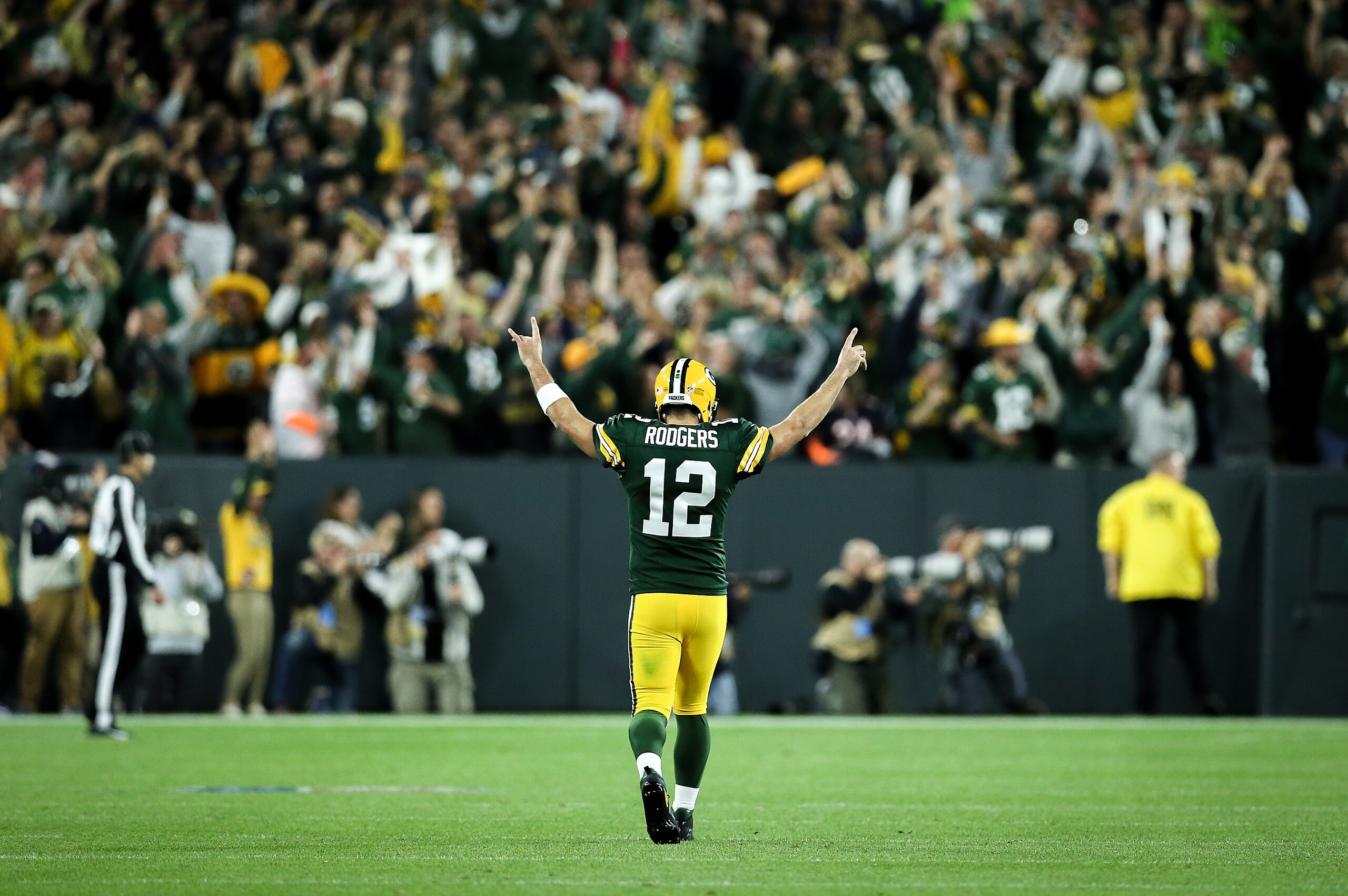 GREEN BAY, WI - SEPTEMBER 09:  Aaron Rodgers #12 of the Green Bay Packers celebrates after scoring a touchdown in the fourth quarter against the Chicago Bears at Lambeau Field on September 9, 2018 in Green Bay, Wisconsin.  (Photo by Dylan Buell/Getty Imag