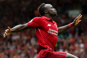 LIVERPOOL, ENGLAND - AUGUST 12: Sadio Mane of Liverpool celebrates after scoring a goal to make it 3-0 during the Premier League match between Liverpool FC and West Ham United at Anfield on August 12, 2018 in Liverpool, United Kingdom. (Photo by Robbie Ja