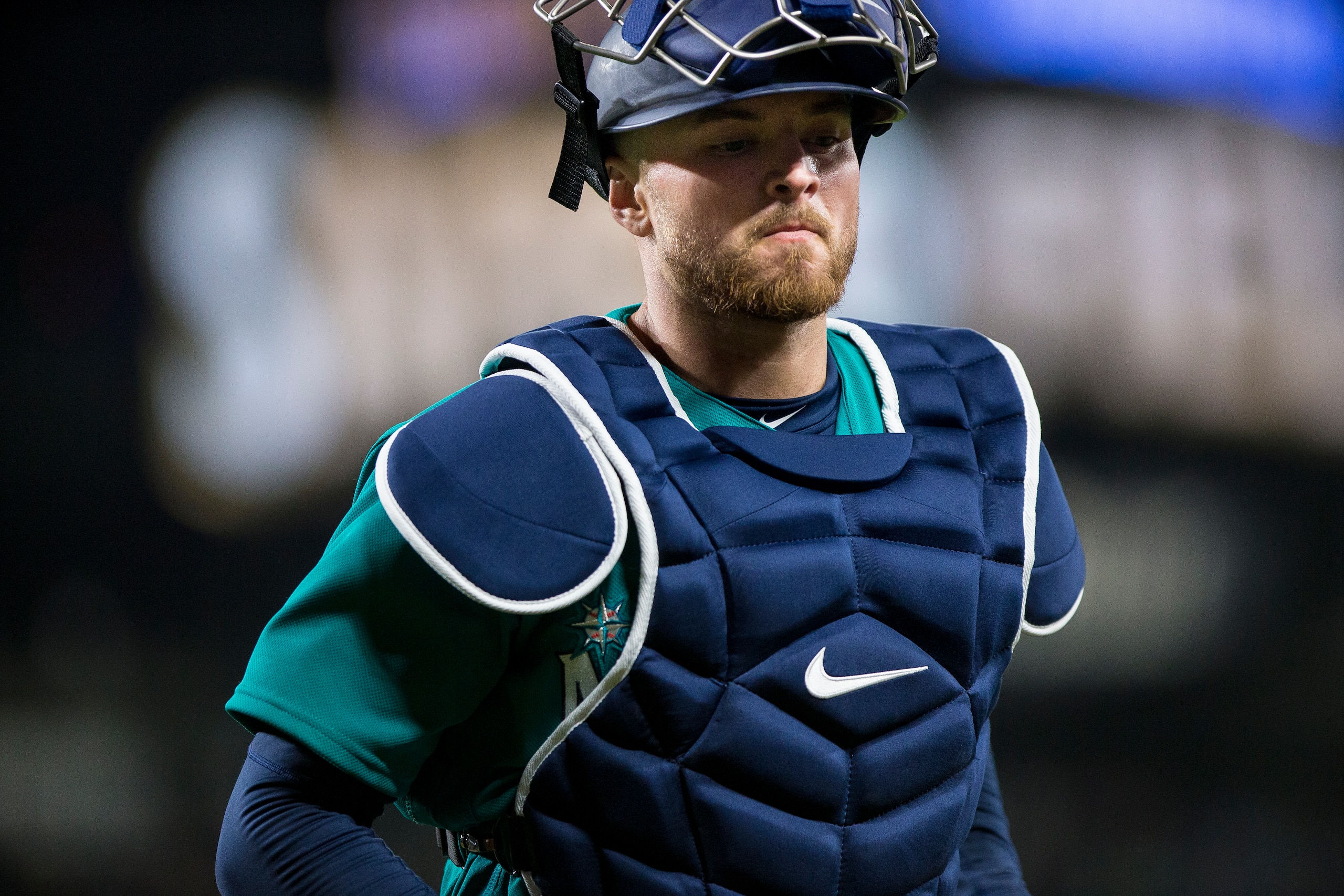 SEATTLE, WA - APRIL 13:  Mike Marjama #10 of the Seattle Mariners jogs off the field after the seventh inning against the Oakland Athletics on April 13, 2018 in Seattle, Washington. The Seattle Mariners beat the Oakland Athletics 7-4. (Photo by Lindsey Wa