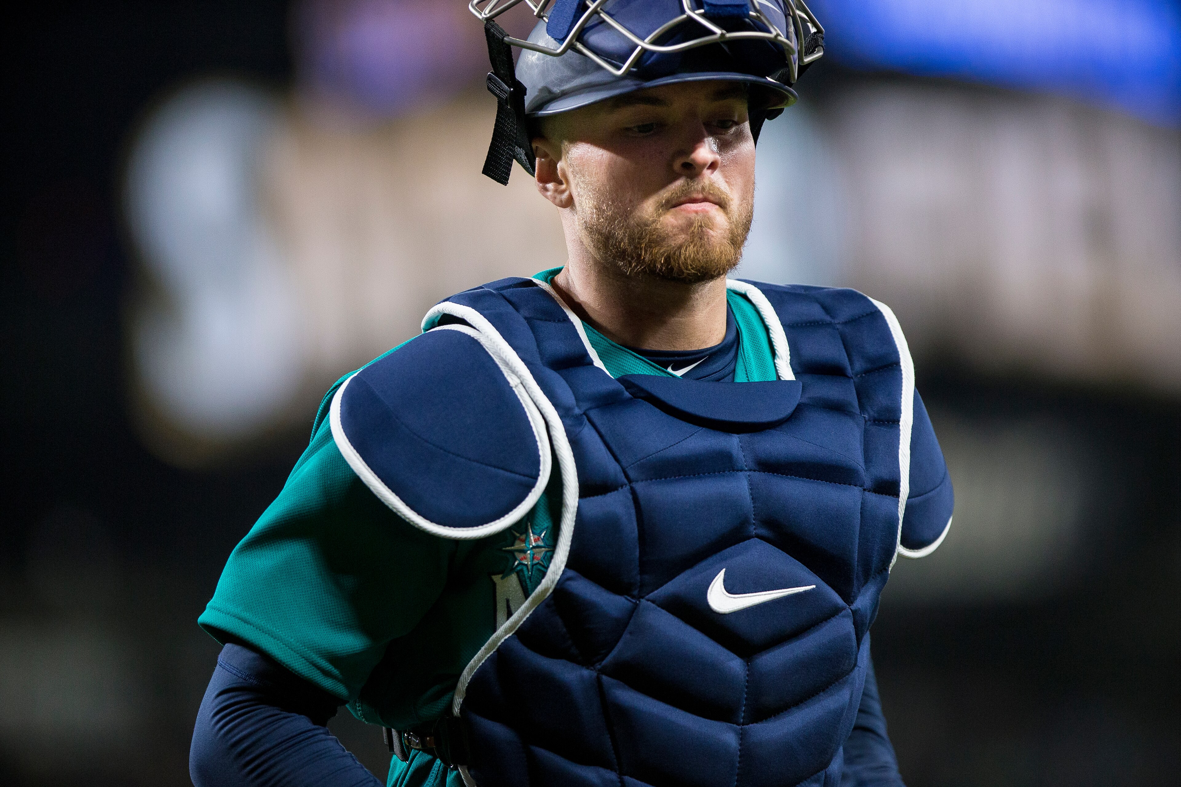 SEATTLE, WA - APRIL 13:  Mike Marjama #10 of the Seattle Mariners jogs off the field after the seventh inning against the Oakland Athletics on April 13, 2018 in Seattle, Washington. The Seattle Mariners beat the Oakland Athletics 7-4. (Photo by Lindsey Wa