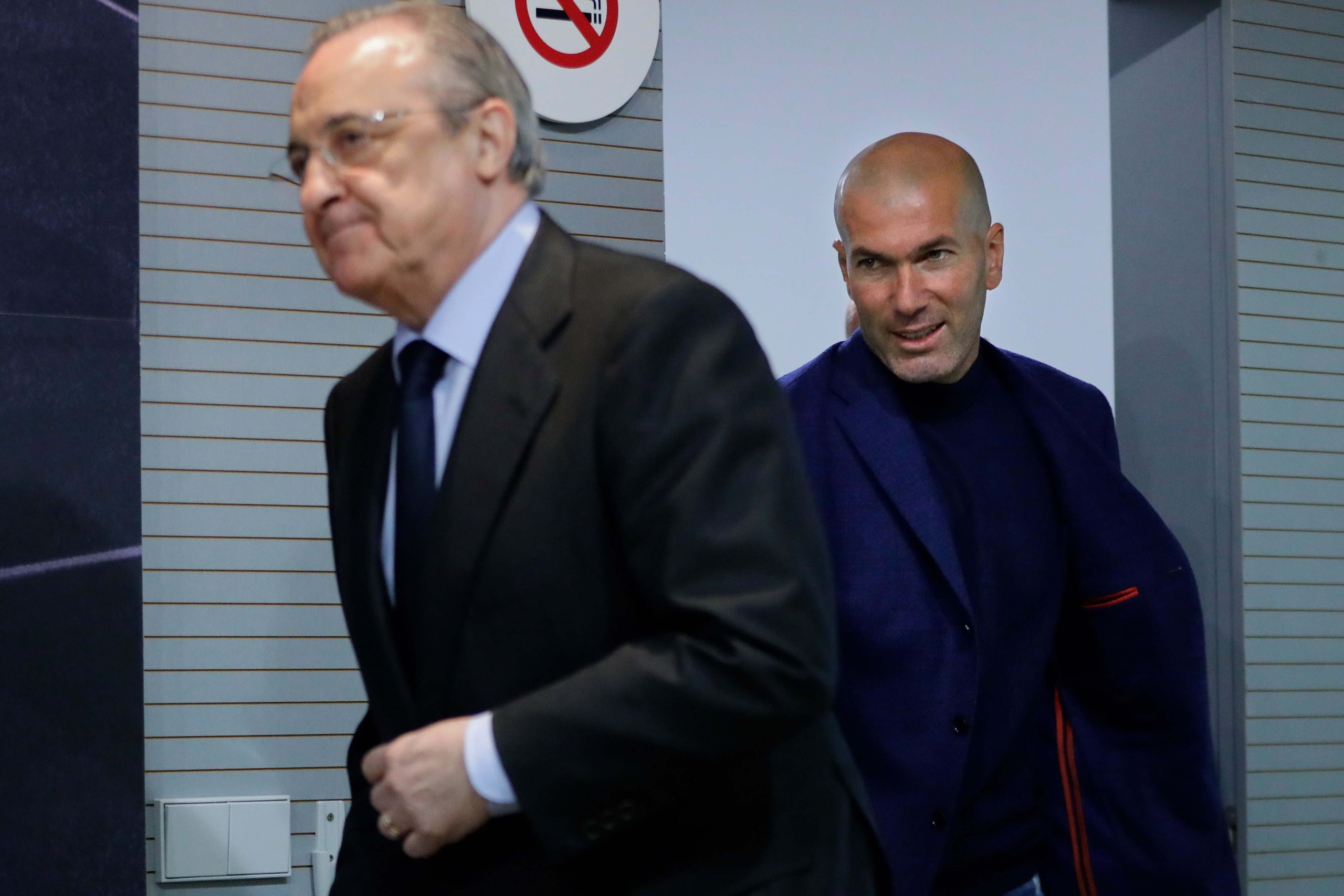 MADRID, SPAIN - MAY 31: Real Madrid CF president Florentino Perez (L) and Zinedine Zidane (R) arrive at a press conference to announce his resignation as Real Madrid manager at Valdebebas Sport City on May 31, 2018 in Madrid, Spain. Zidane steps down from