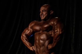 Egyptian bodybuilder Mamdouh Elssbiay, aka Big Ramy, poses on stage during a competition at the Arnold Classic Brazil 2015 in Rio de Janeiro, Brazil, on May 30, 2015. The 3rd annual multi-disciplinary sports competition is named after Austrian-American ac