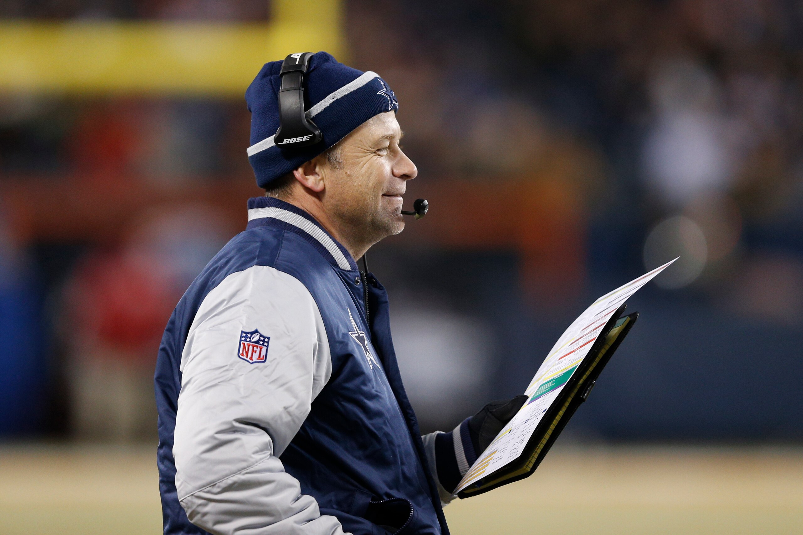 CHICAGO, IL - DECEMBER 4: Offensive assistant coach Scott Linehan of the Dallas Cowboys looks on during the game against the Chicago Bears at Soldier Field on December 4, 2014 in Chicago, Illinios. The Cowboys defeated the Bears 41-28. (Photo by Joe Robbi CHICAGO, IL - DECEMBER 4: Offensive assistant coach Scott Linehan of the Dallas Cowboys looks on during the game against the Chicago Bears at Soldier Field on December 4, 2014 in Chicago, Illinios. The Cowboys defeated the Bears 41-28. (Photo by Joe Robbi