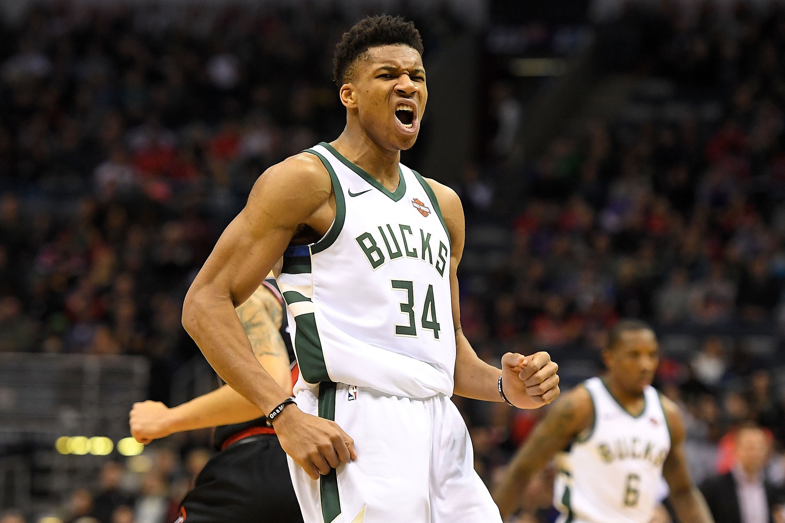 MILWAUKEE, WI - DECEMBER 26:  Giannis Antetokounmpo #34 of the Milwaukee Bucks celebrates a dunk against the Chicago Bulls during the first half of a game at the Bradley Center on December 26, 2017 in Milwaukee, Wisconsin.  NOTE TO USER: User expressly ac