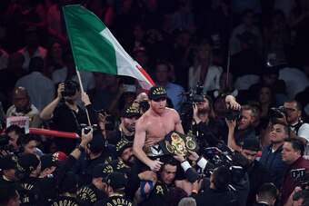LAS VEGAS, NV - SEPTEMBER 15:  Canelo Alvarez celebrates after his majority decision win over Gennady Golovkin during their WBC/WBA middleweight title fight at T-Mobile Arena on September 15, 2018 in Las Vegas, Nevada.  (Photo by Ethan Miller/Getty Images