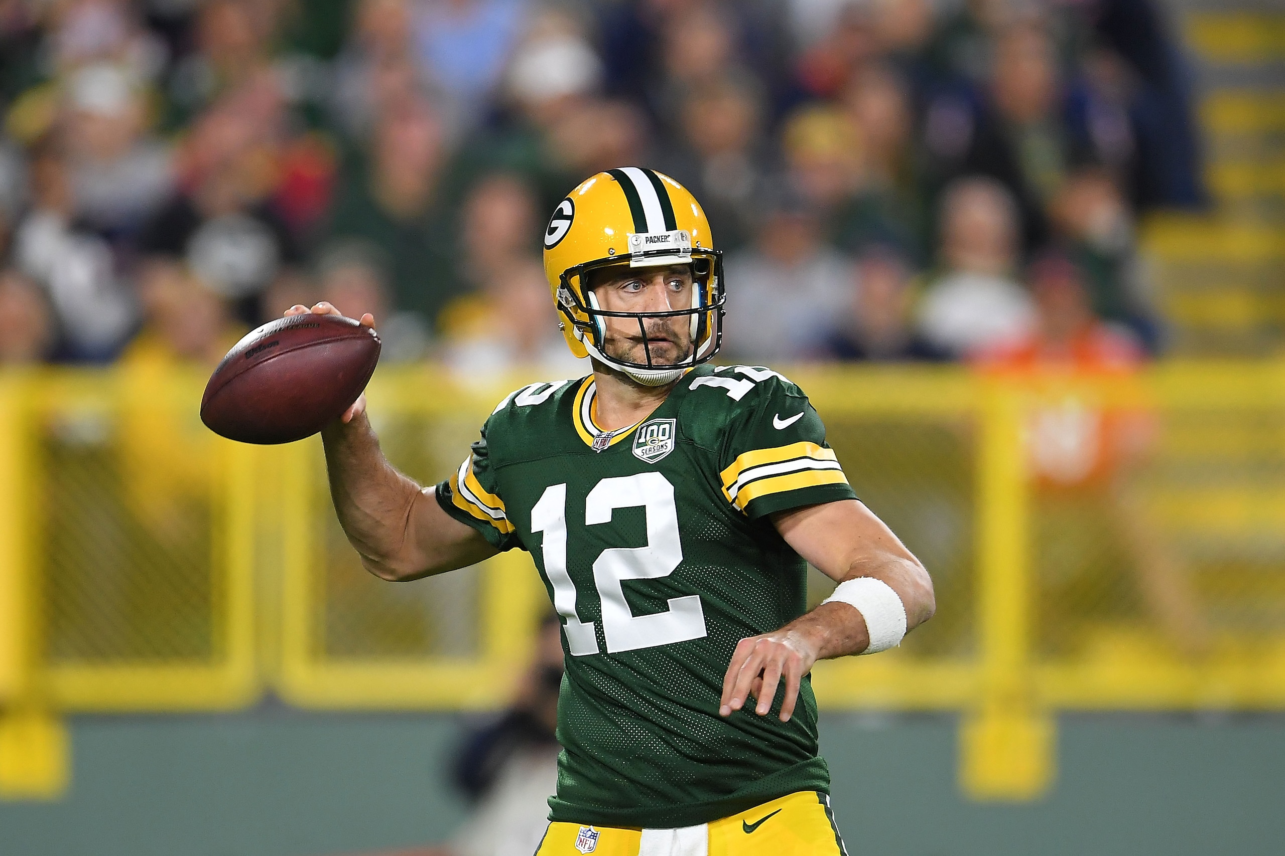 GREEN BAY, WI - SEPTEMBER 09:  Aaron Rodgers #12 of the Green Bay Packers drops back to pass during a game against the Chicago Bears at Lambeau Field on September 9, 2018 in Green Bay, Wisconsin.  (Photo by Stacy Revere/Getty Images)