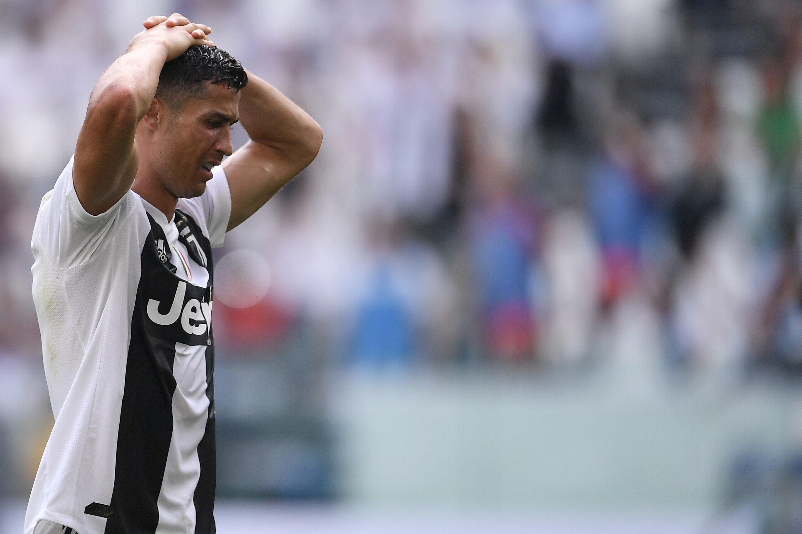 Juventus' Portuguese forward Cristiano Ronaldo reacts during the Italian Serie A football match Juventus vs Sassuolo on September 16, 2018 at the Juventus stadium in Turin. (Photo by Marco BERTORELLO / AFP)        (Photo credit should read MARCO BERTORELL