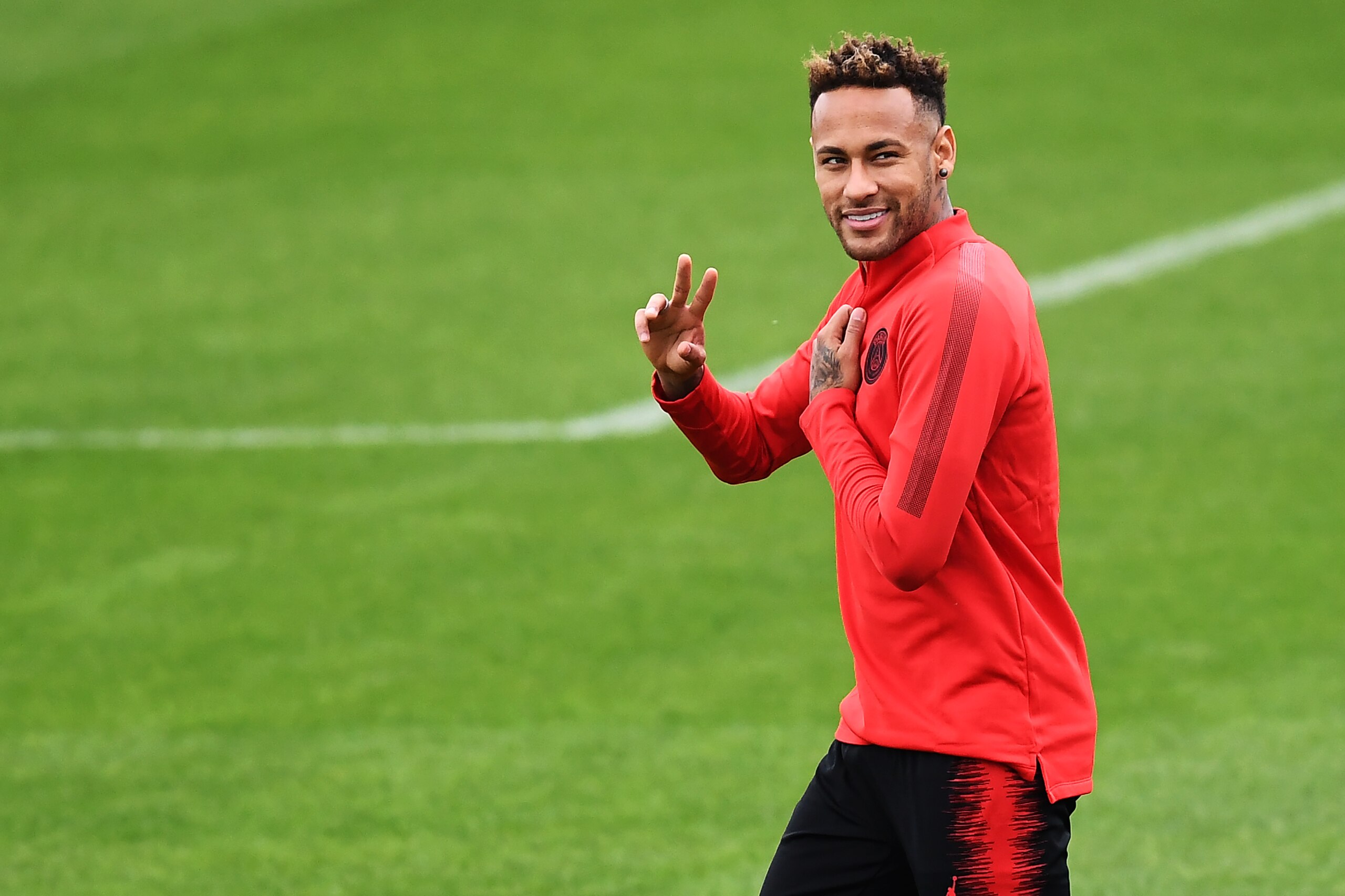 Paris Saint-Germain's Brazilian forward Neymar gestures during a training session at the team's 'Camp des Loges' training grounds in Saint-Germain-en-Laye, west of Paris, on September 13, 2018, on the eve of the French L1 football match between Paris Sain
