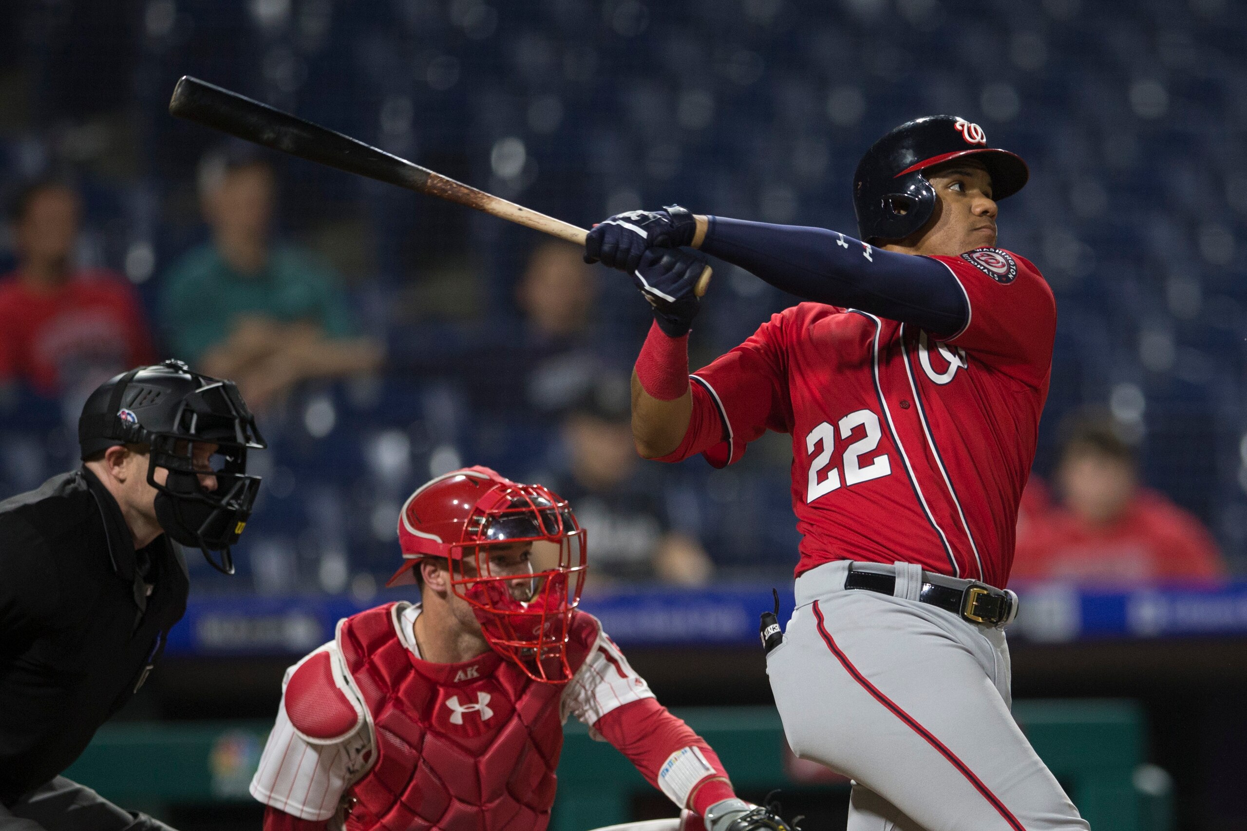 PHILADELPHIA, PA - SEPTEMBER 11: Juan Soto #22 of the Washington Nationals hits a solo home run in the top of the tenth inning against the Philadelphia Phillies in game 2 of the doubleheader at Citizens Bank Park on September 11, 2018 in Philadelphia, Pen
