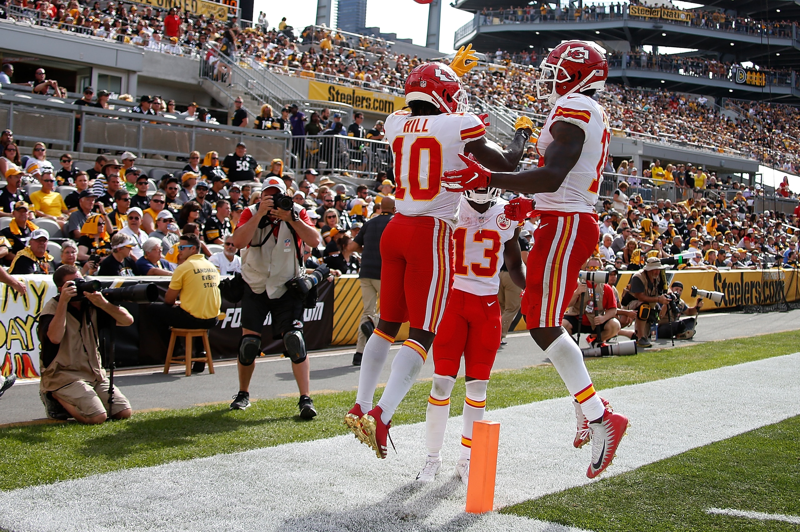 PITTSBURGH, PA - SEPTEMBER 16: Tyreek Hill #10 of the Kansas City Chiefs celebrates with Sammy Watkins #14 after a 29 yard touchdown reception in the fourth quarter during the game against the Pittsburgh Steelers at Heinz Field on September 16, 2018 in Pi