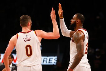 BROOKLYN, NY - MARCH 25:  (NEW YORK DAILIES OUT)    LeBron James #23 and Kevin Love #0 of the Cleveland Cavaliers in action against the Brooklyn Nets at Barclays Center on March 25, 2018 in the Brooklyn borough of New York City.  The Cavaliers defeated th
