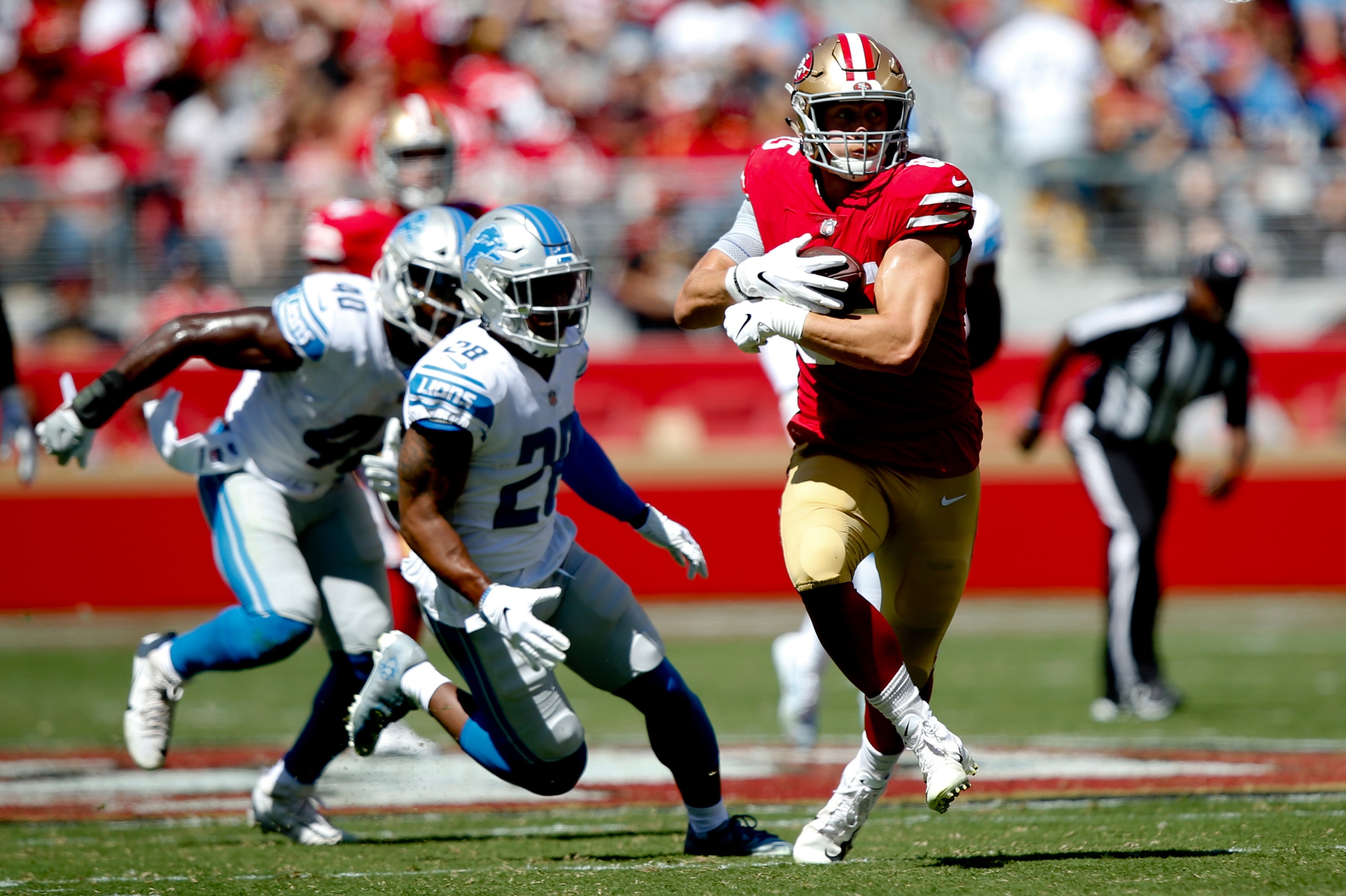 SANTA CLARA, CA - SEPTEMBER 16: George Kittle #85 of the San Francisco 49ers runs after making a reception during the game against the Detroit Lions at Levi Stadium on September 16, 2018 in Santa Clara, California. The 49ers defeated the Lions 30-27. (Pho