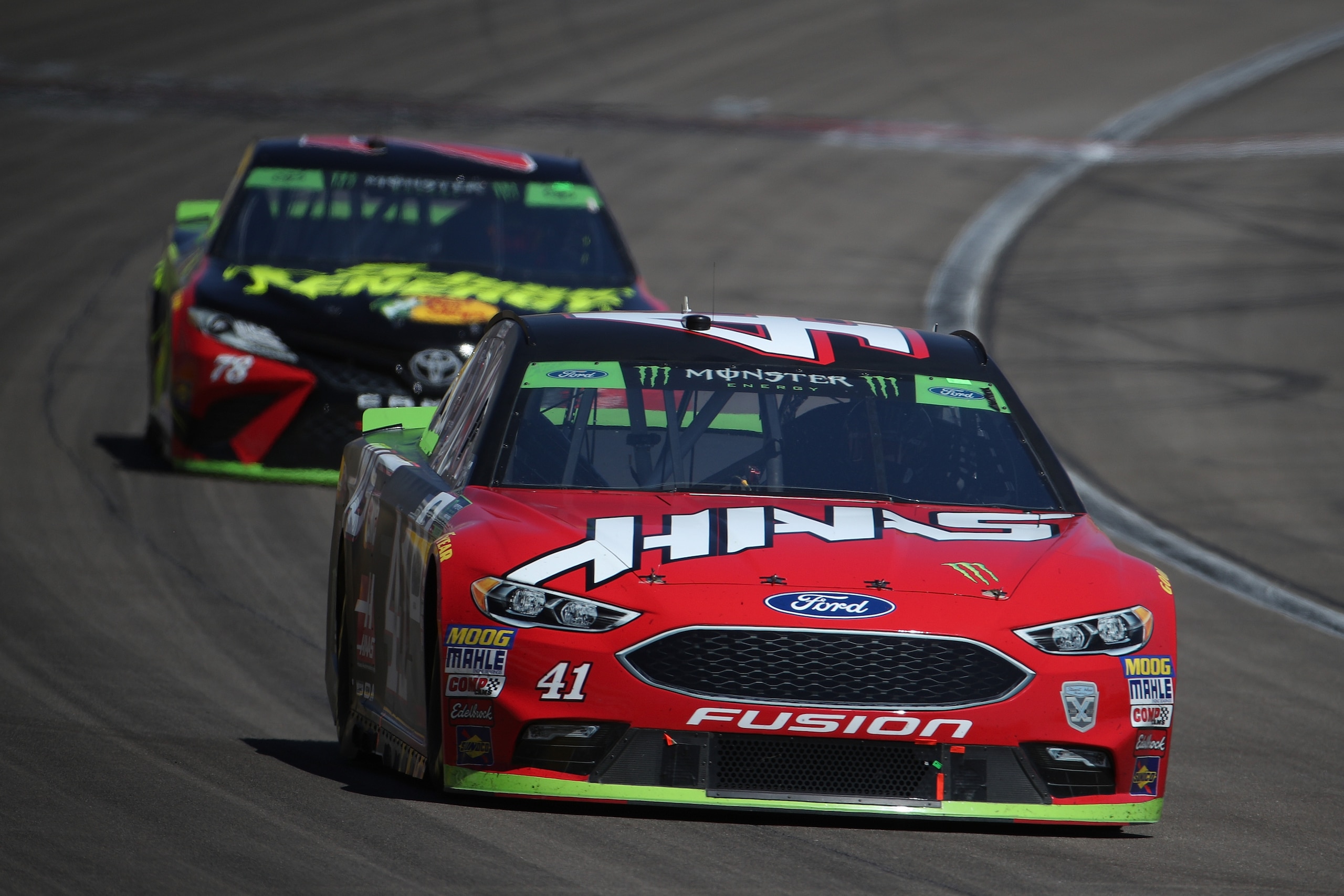 LAS VEGAS, NV - SEPTEMBER 16:  Kurt Busch, driver of the #41 Haas Automation Ford, leads Martin Truex Jr., driver of the #78 5-hour ENERGY Toyota, during the Monster Energy NASCAR Cup Series SouthPoint 400 at Las Vegas Motor Speedway on September 16, 2018