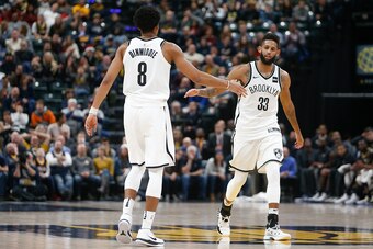 INDIANAPOLIS, IN - DECEMBER 23:  Allen Crabbe #33 of the Brooklyn Nets celebrates with Spencer Dinwiddie #8 against the Indiana Pacers during the second half at Bankers Life Fieldhouse on December 23, 2017 in Indianapolis, Indiana. NOTE TO USER: User expr