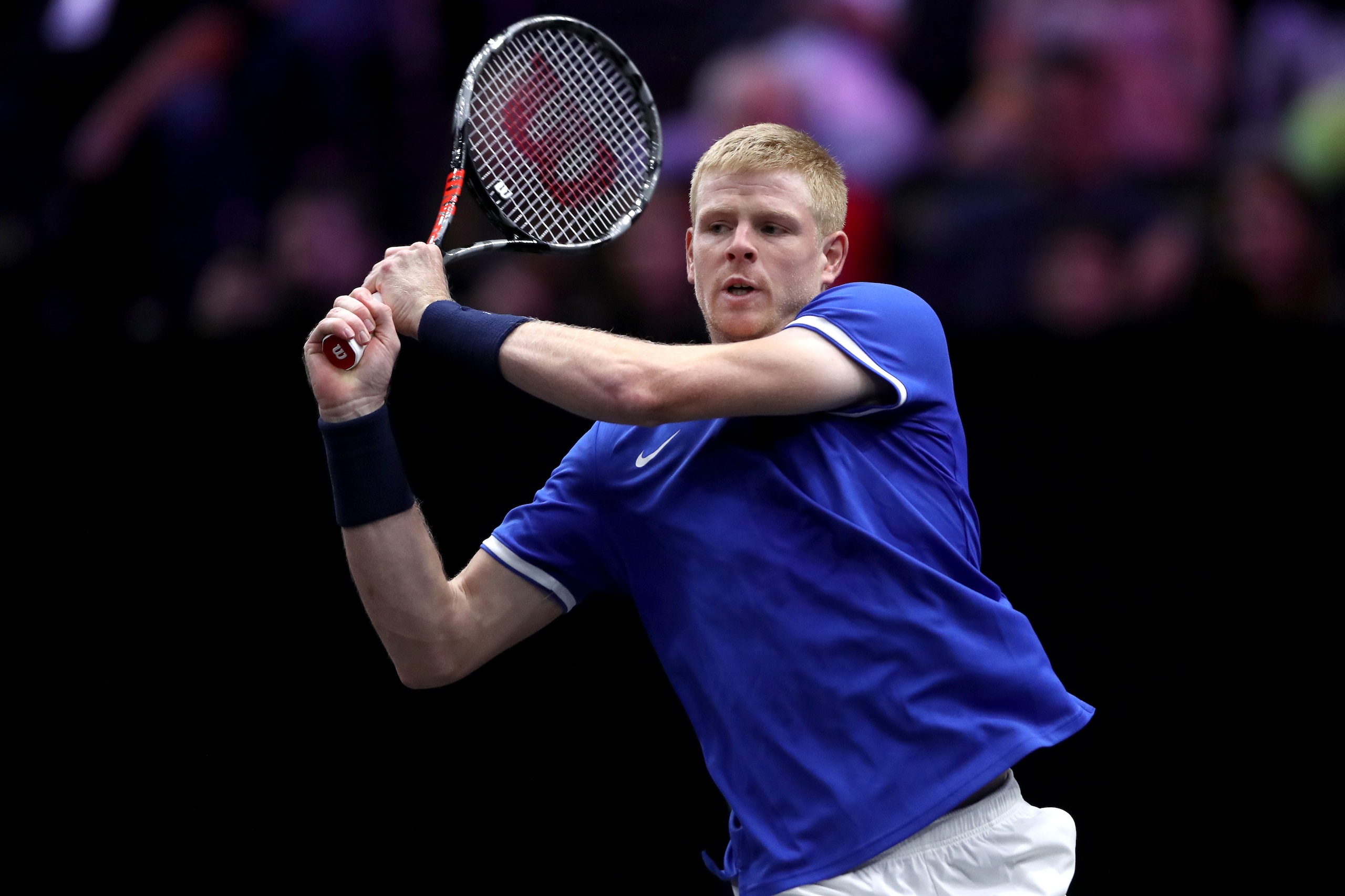 CHICAGO, IL - SEPTEMBER 21:  Team Europe Kyle Edmund of Great Britain returns a shot against Team World Jack Sock of the United States during their Men's Singles match on day one of the 2018 Laver Cup at the United Center on September 21, 2018 in Chicago,
