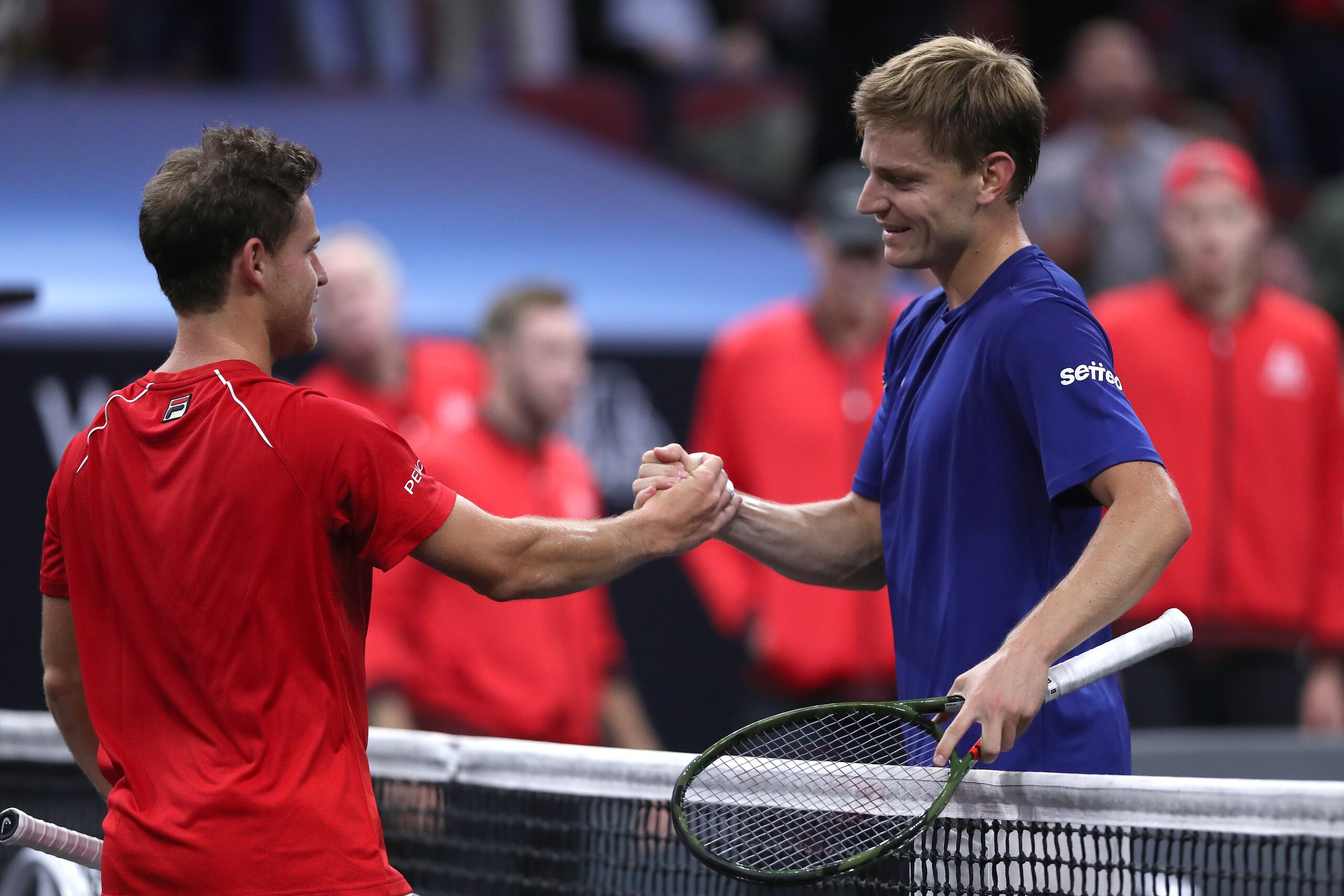CHICAGO, IL - SEPTEMBER 21:  Team Europe David Goffin of Belgium shakes hands Team World Diego Schwartzman of Argentina after defeating him in their Men's Singles match on day one of the 2018 Laver Cup at the United Center on September 21, 2018 in Chicago