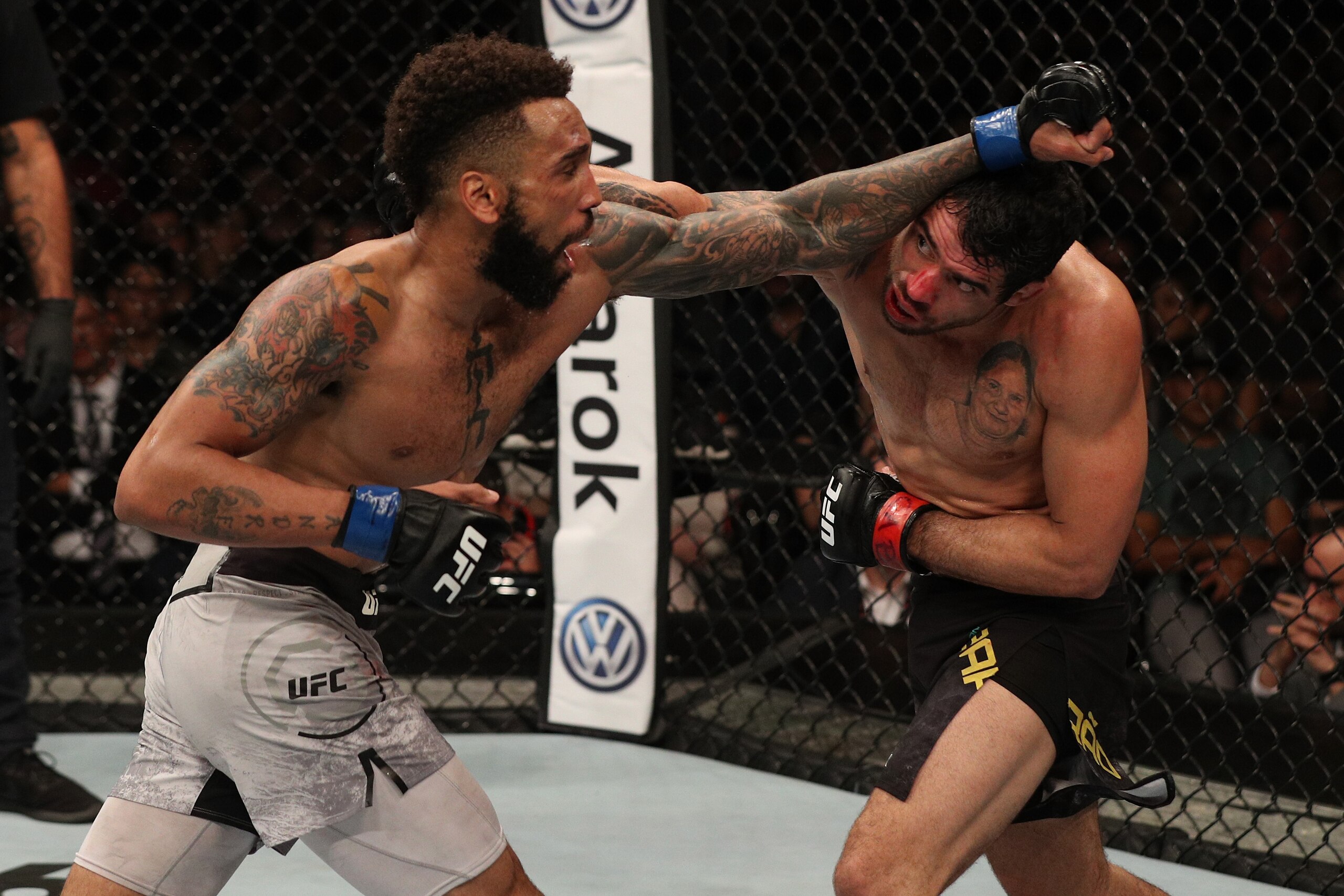 SAO PAULO, BRAZIL - SEPTEMBER 22:  (L-R) Andre Ewell punches Renan Barao of Brazil in their bantamweight bout during the UFC Fight Night event at Ibirapuera Gymnasium on September 22, 2018 in Sao Paulo, Brazil. (Photo by Buda Mendes/Zuffa LLC/Zuffa LLC vi