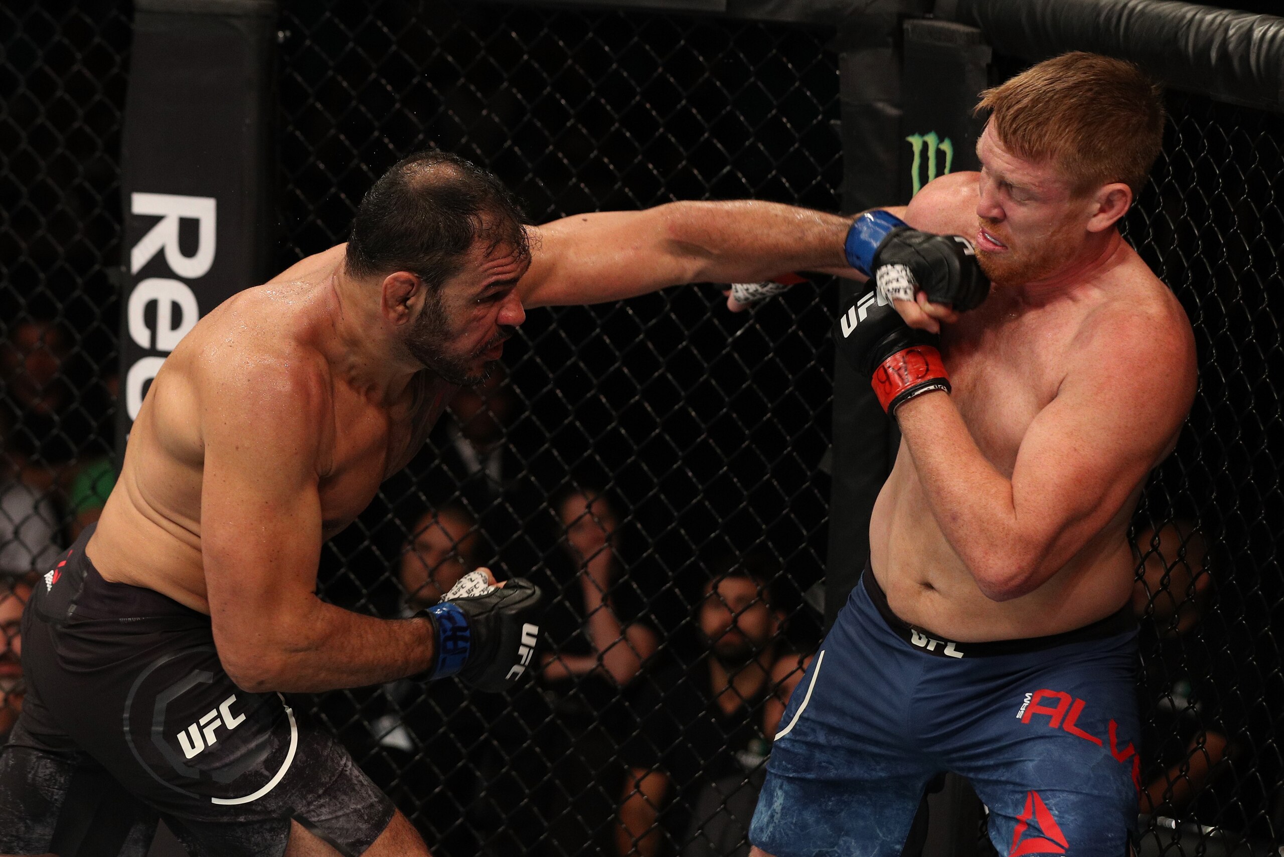 SAO PAULO, BRAZIL - SEPTEMBER 22:  (L-R) Antonio Rogerio Nogueira of Brazil punches Sam Alvey in their light heavyweight bout during the UFC Fight Night event at Ibirapuera Gymnasium on September 22, 2018 in Sao Paulo, Brazil. (Photo by Buda Mendes/Zuffa 