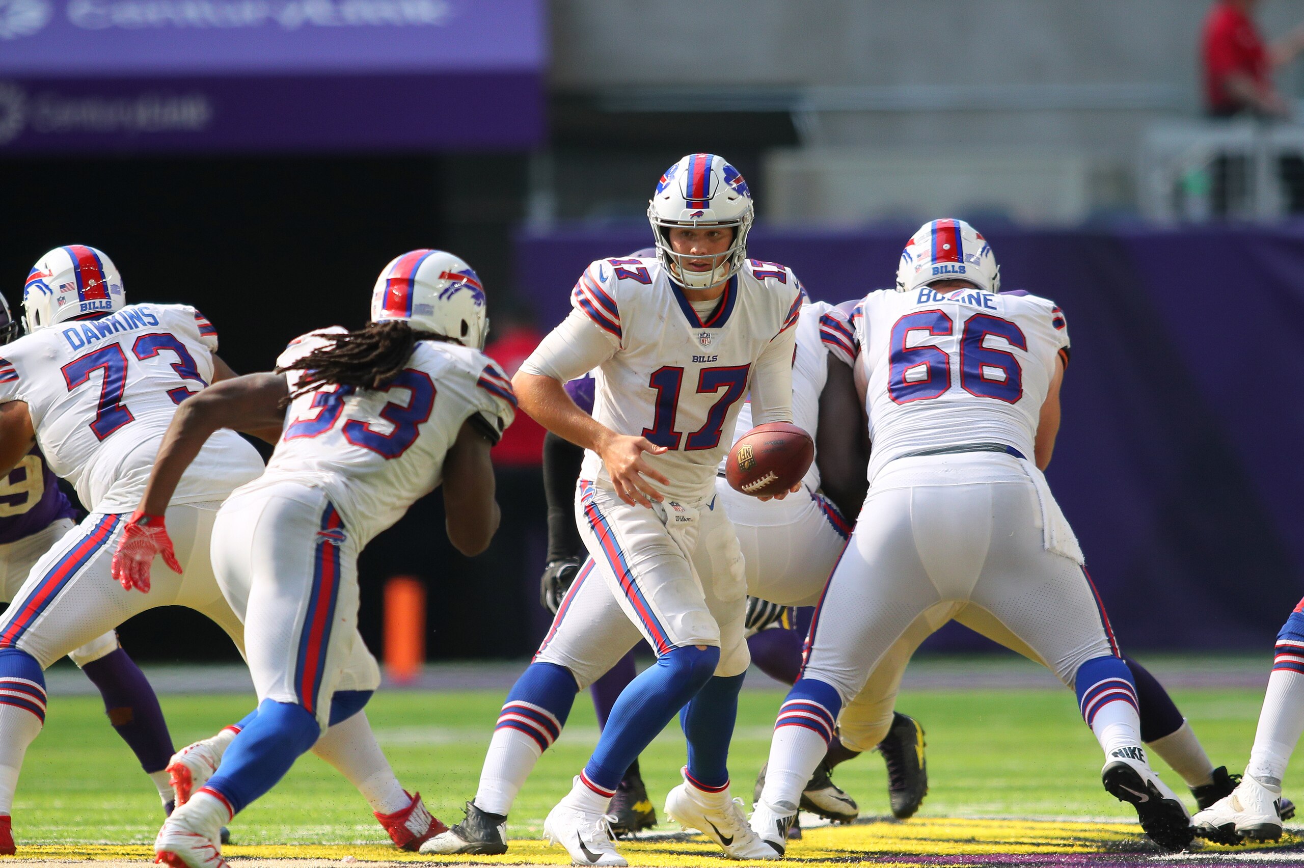 MINNEAPOLIS, MN - SEPTEMBER 23: Josh Allen #17 of the Buffalo Bills hands the ball off to Chris Ivory #33 in the fourth quarter of the game against the Minnesota Vikings at U.S. Bank Stadium on September 23, 2018 in Minneapolis, Minnesota. (Photo by Adam 