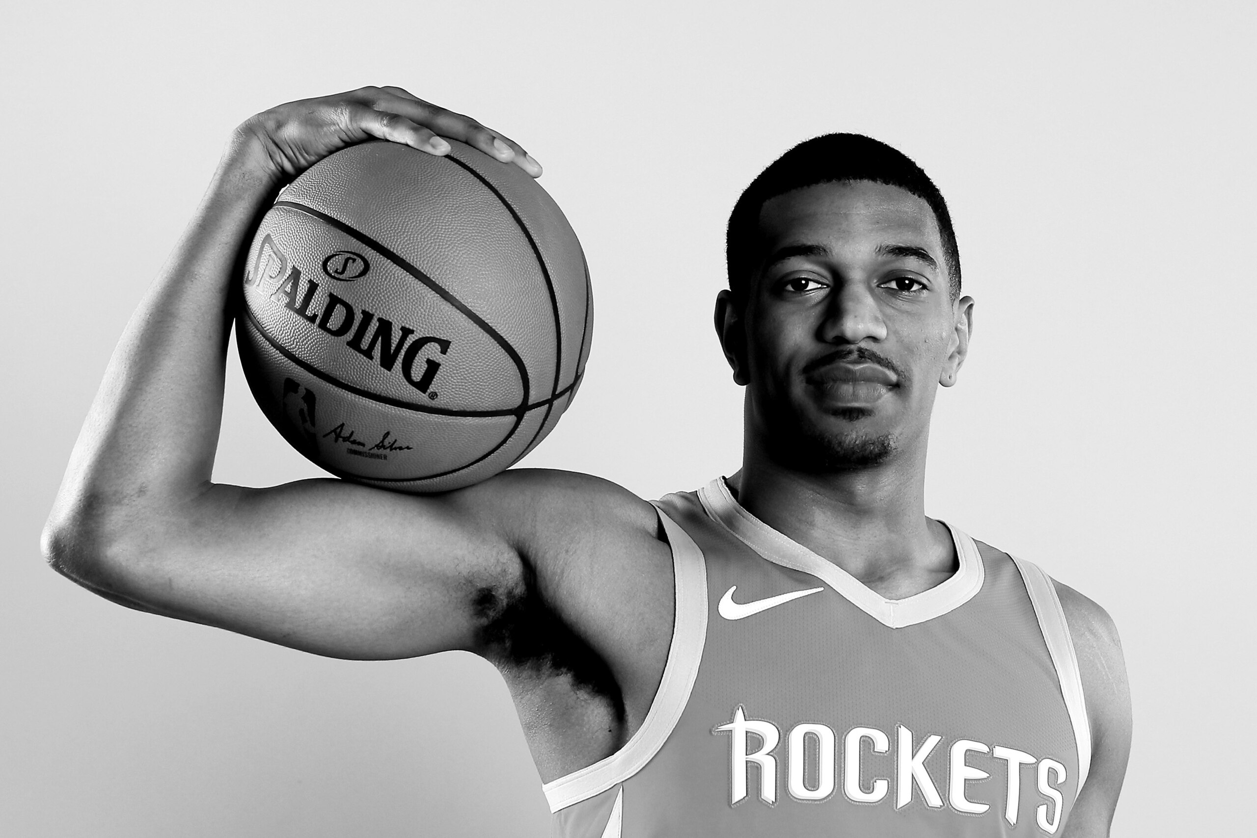 TARRYTOWN, NY - AUGUST 12:  (EDITOR'S NOTE:THIS IMAGE WAS CONVERTED TO BLACK AND WHITE) De'Anthony Melton of the Houston Rockeets poses for a portrait during the 2018 NBA Rookie Photo Shoot at MSG Training Center on August 12, 2018 in Tarrytown, New York.