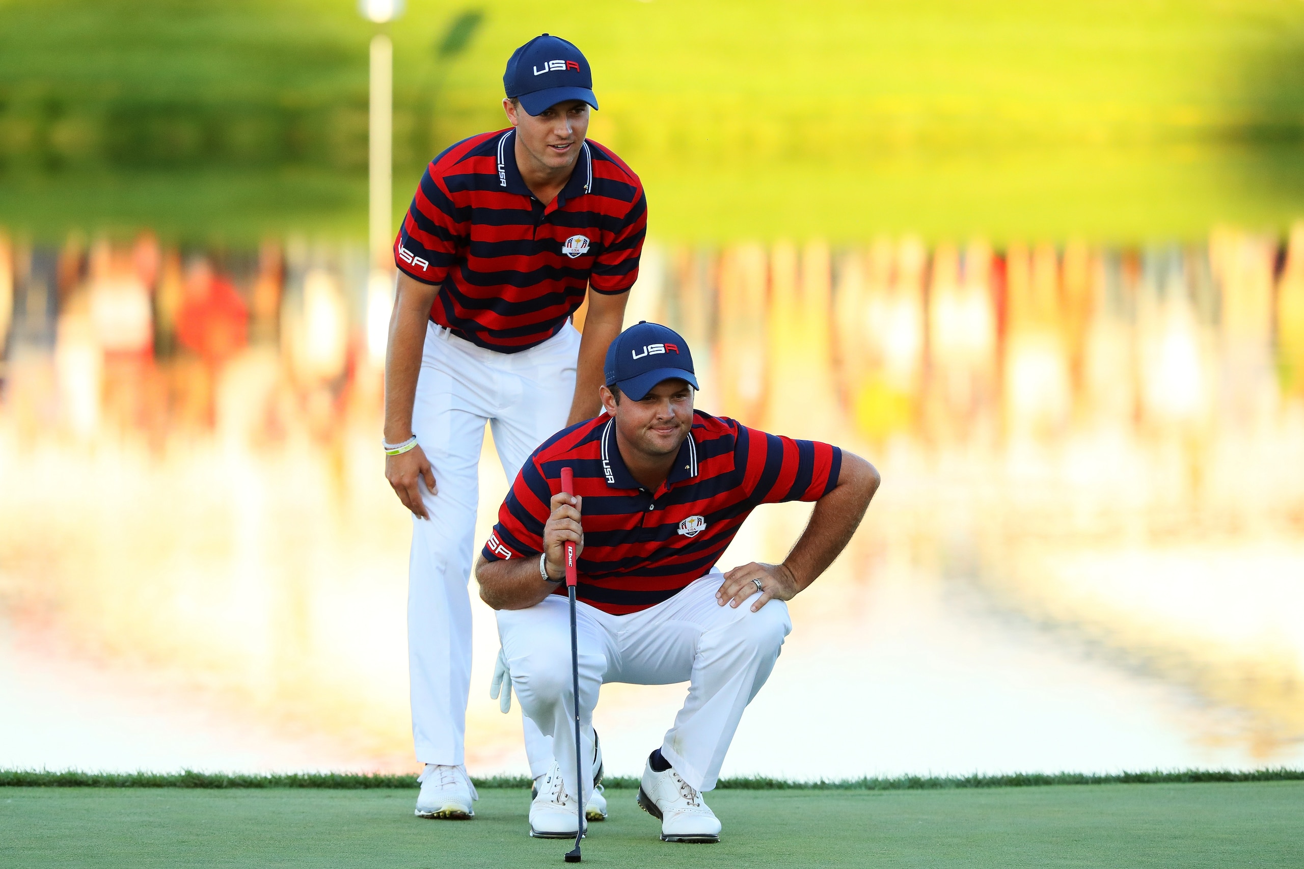 CHASKA, MN - OCTOBER 01: Jordan Spieth and Patrick Reed of the United States line up a putt on the 17th green during afternoon fourball matches of the 2016 Ryder Cup at Hazeltine National Golf Club on October 1, 2016 in Chaska, Minnesota.  (Photo by Andre