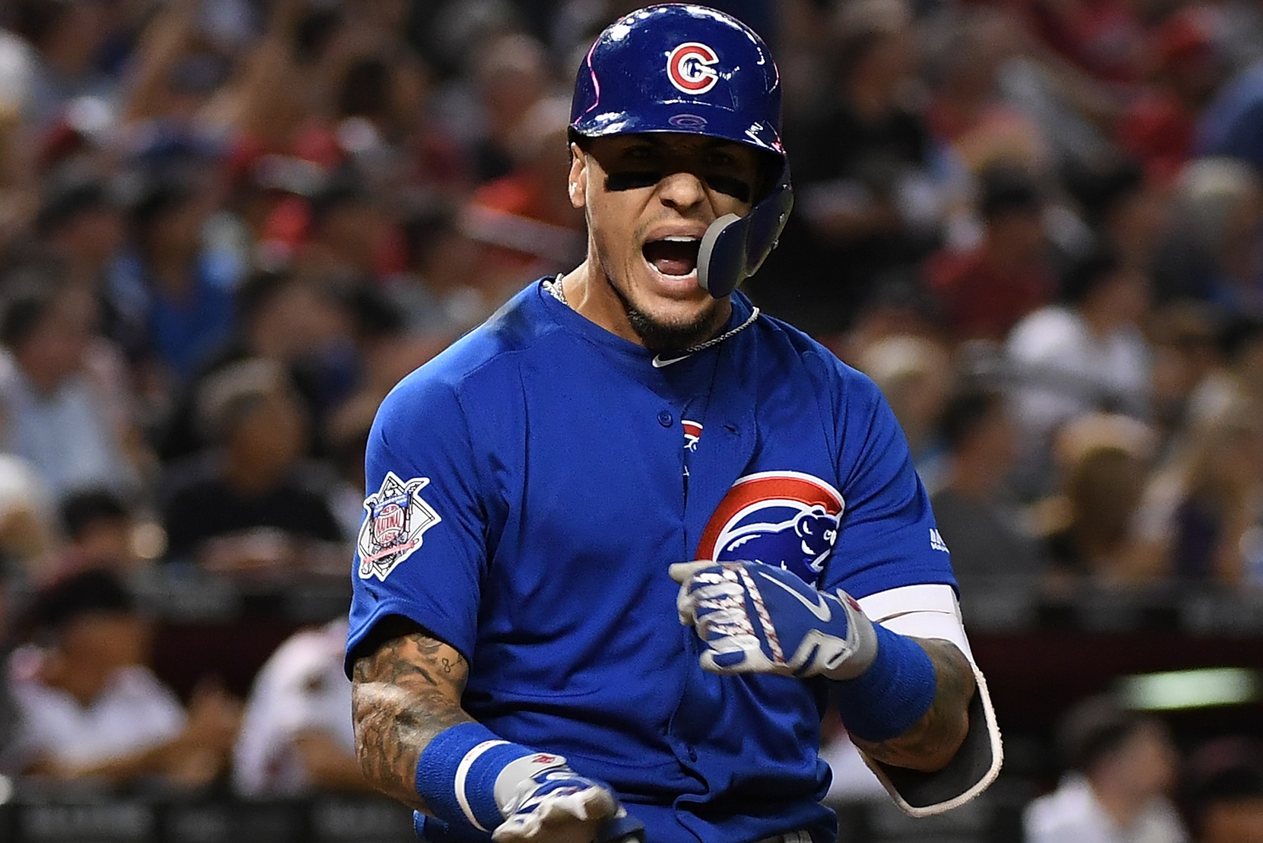 PHOENIX, AZ - SEPTEMBER 17:  Javier Baez #9 of the Chicago Cubs reacts after hitting a two run home run during the sixth inning against the Arizona Diamondbacks at Chase Field on September 17, 2018 in Phoenix, Arizona.  (Photo by Norm Hall/Getty Images)