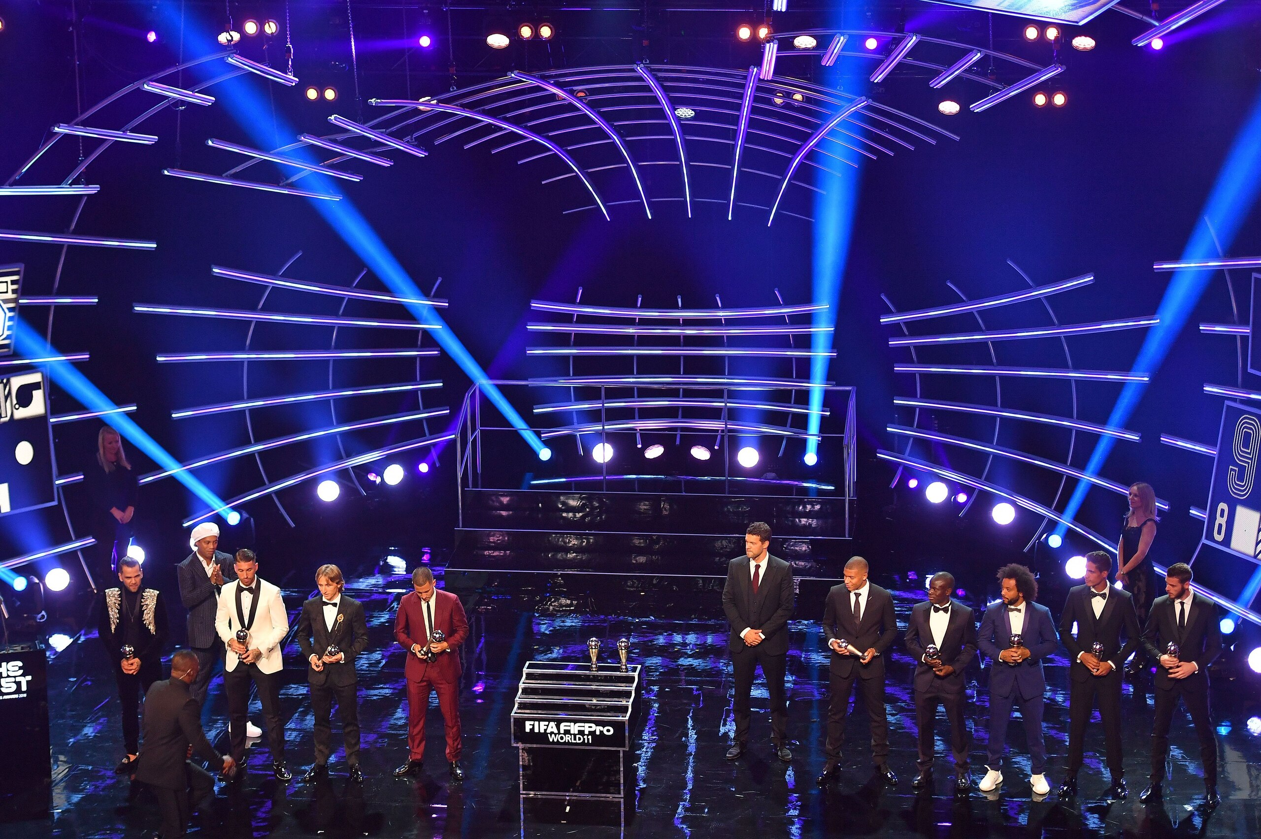 (L-R) Brazil and PSG defender Dani Alves, Presenter Former Brazil and Barcelona player Ronaldinho, Real madrid and Spain defender Sergio Ramos, Real Madrid and Croatia midfielder Luka Modric, Chelsea and Belgium midfielder Eden Hazard, presenter former Ge