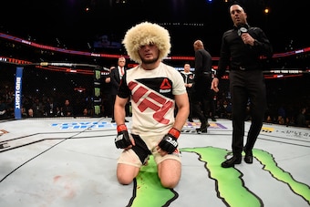 TAMPA, FL - APRIL 16:   Khabib Nurmagomedov celebrates his victory over Darrell Horcher in their lightweight bout during the UFC Fight Night event at Amalie Arena on April 16, 2016 in Tampa, Florida. (Photo by Jeff Bottari/Zuffa LLC/Zuffa LLC via Getty Im