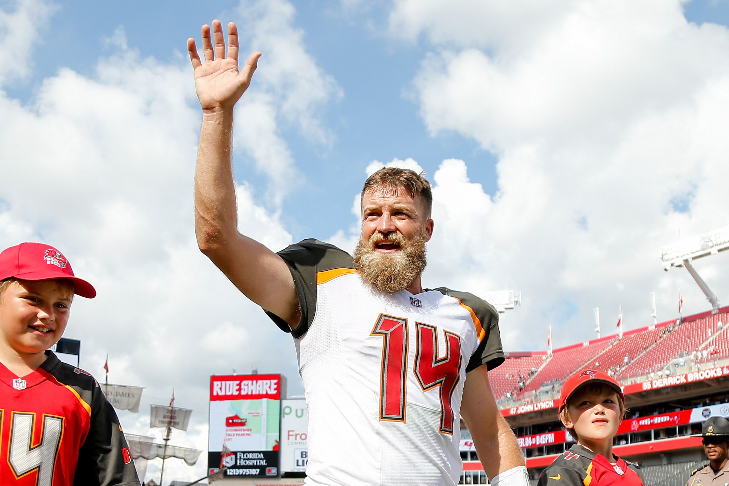 TAMPA, FL - SEPTEMBER 16:  Ryan Fitzpatrick #14 of the Tampa Bay Buccaneers waves to the crowd after they defeated the Philadelphia Eagles 27-21 at Raymond James Stadium on September 16, 2018 in Tampa, Florida.  (Photo by Michael Reaves/Getty Images)
