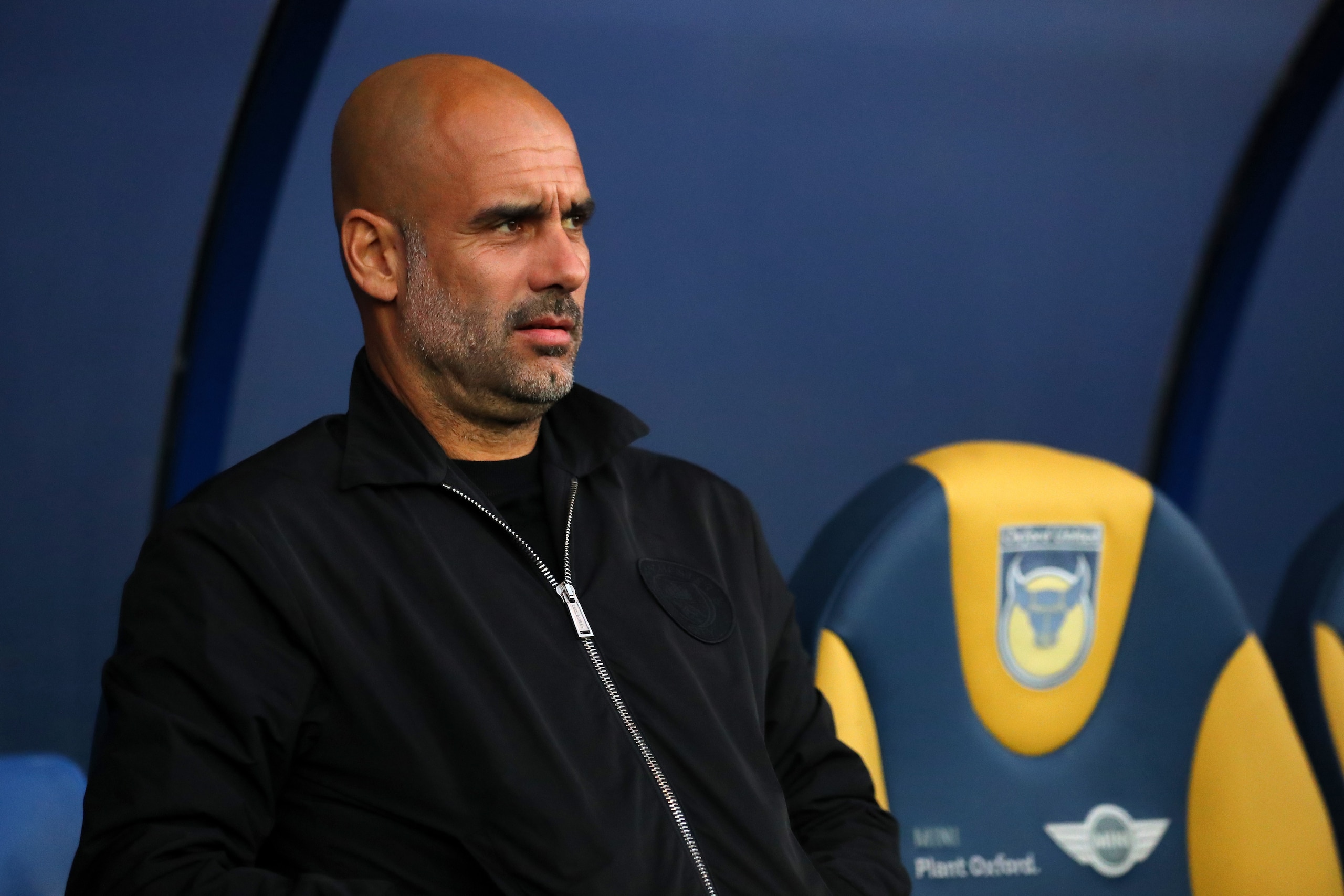 OXFORD, ENGLAND - SEPTEMBER 25:  Josep Guardiola, Manager of Manchester City looks on prior to the Carabao Cup Third Round match between Oxford United and Manchester City at Kassam Stadium on September 25, 2018 in Oxford, England.  (Photo by Warren Little