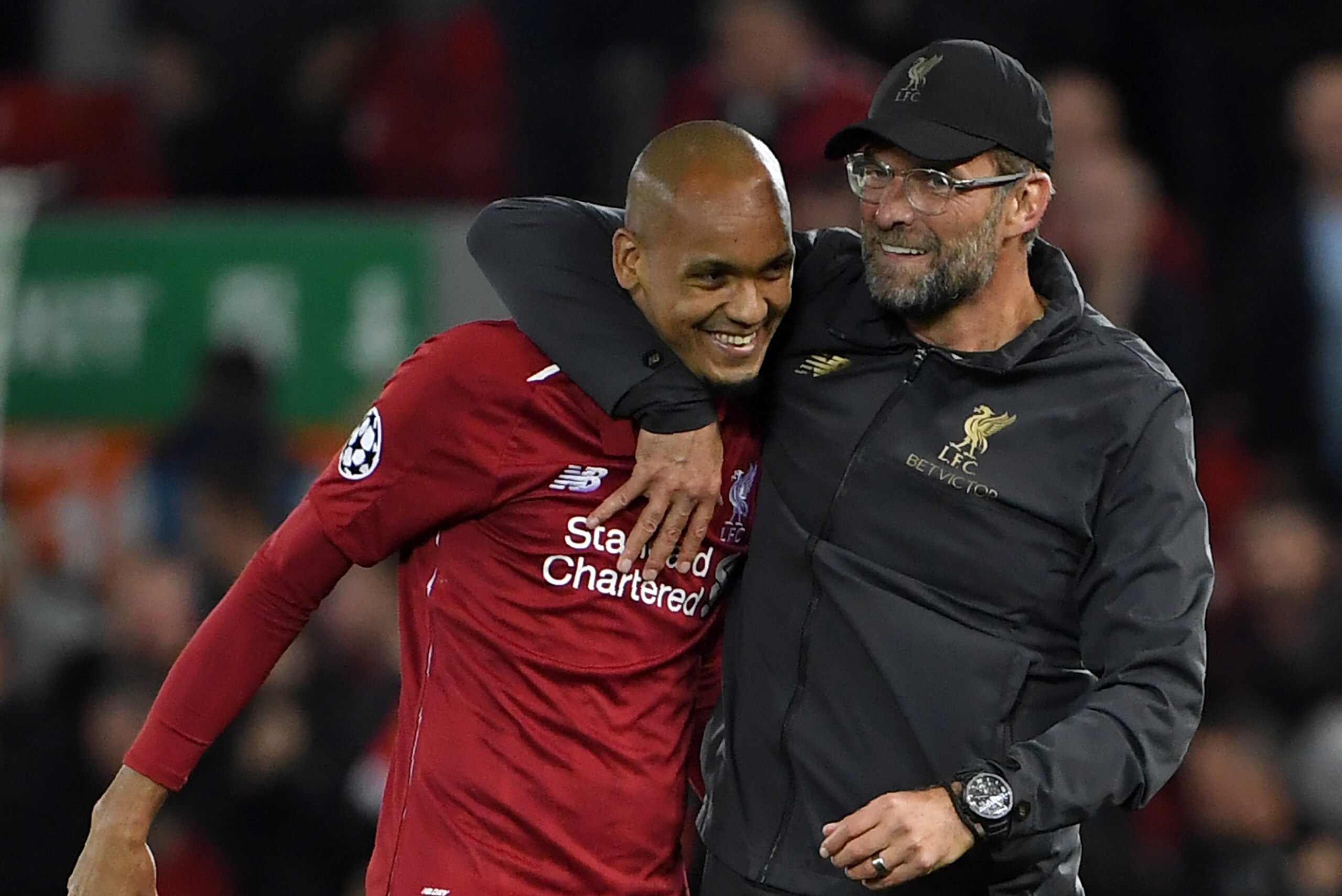 Liverpool's Brazilian midfielder Fabinho (L) and Liverpool's German manager Jurgen Klopp react at the final whistle during the UEFA Champions League group C football match between Liverpool and Paris Saint-Germain at Anfield in Liverpool, north west Engla Liverpool's Brazilian midfielder Fabinho (L) and Liverpool's German manager Jurgen Klopp react at the final whistle during the UEFA Champions League group C football match between Liverpool and Paris Saint-Germain at Anfield in Liverpool, north west Engla