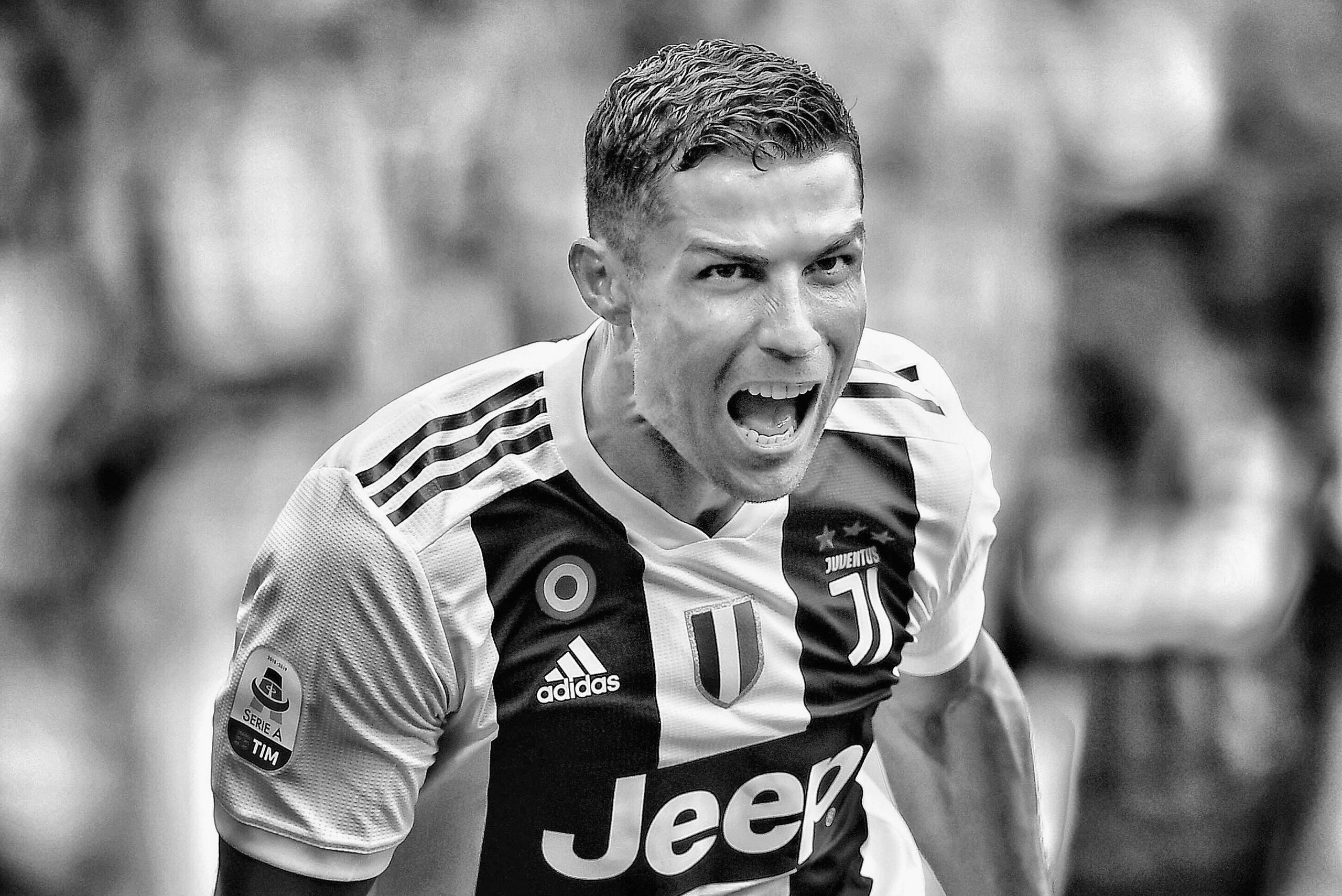 TURIN, ITALY - SEPTEMBER 16: (EDITORS NOTE: This image was altered using a digital filter) Cristiano Ronaldo of Juventus celebrates after scoring the opening goal during the serie A match between Juventus and US Sassuolo at Allianz Stadium on September 1 TURIN, ITALY - SEPTEMBER 16: (EDITORS NOTE: This image was altered using a digital filter) Cristiano Ronaldo of Juventus celebrates after scoring the opening goal during the serie A match between Juventus and US Sassuolo at Allianz Stadium on September 1