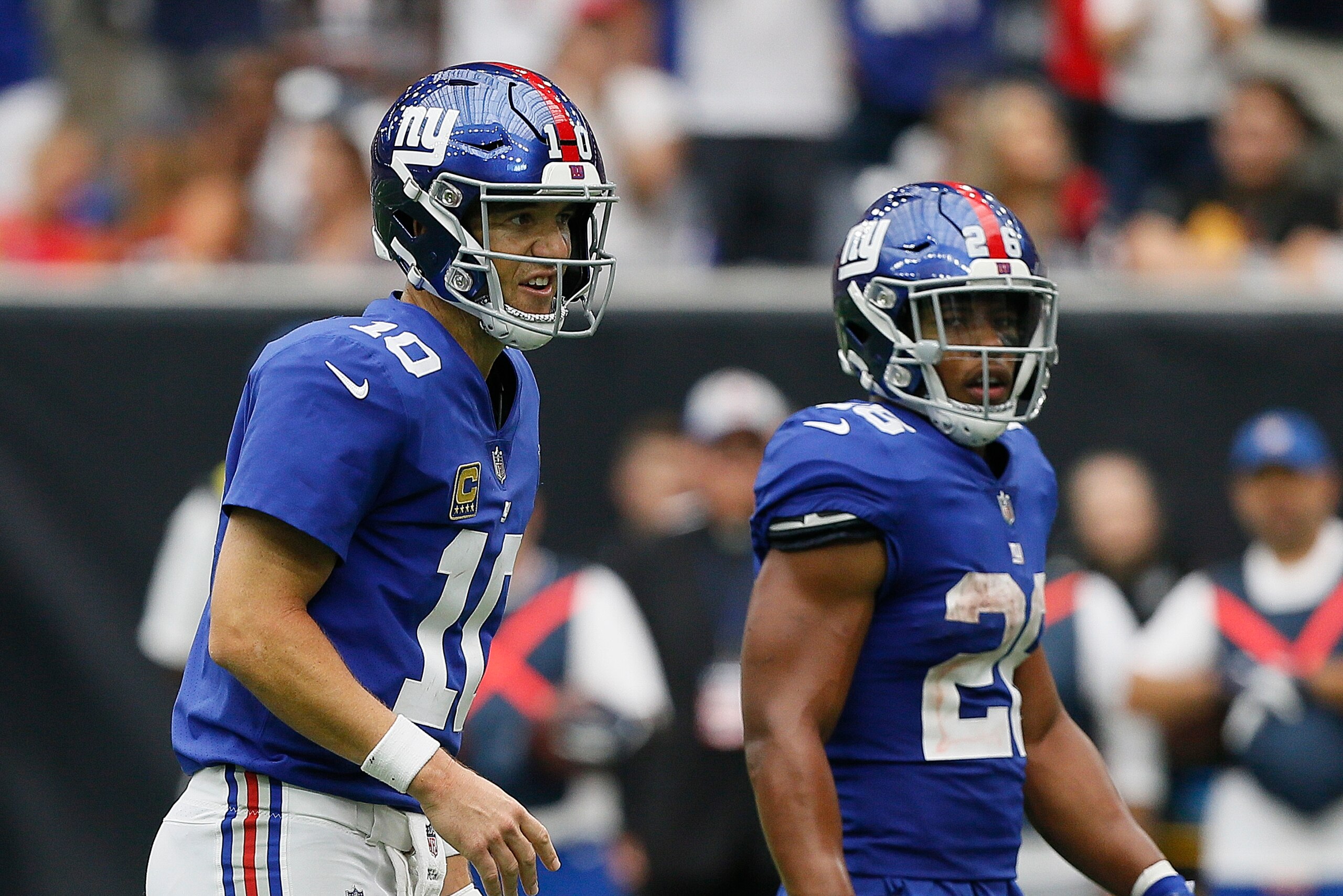 HOUSTON, TX - SEPTEMBER 23: Eli Manning #10 of the New York Giants calls out a play as Saquon Barkley #26 looks on against the Houston Texans at NRG Stadium on September 23, 2018 in Houston, Texas. (Photo by Bob Levey/Getty Images)
