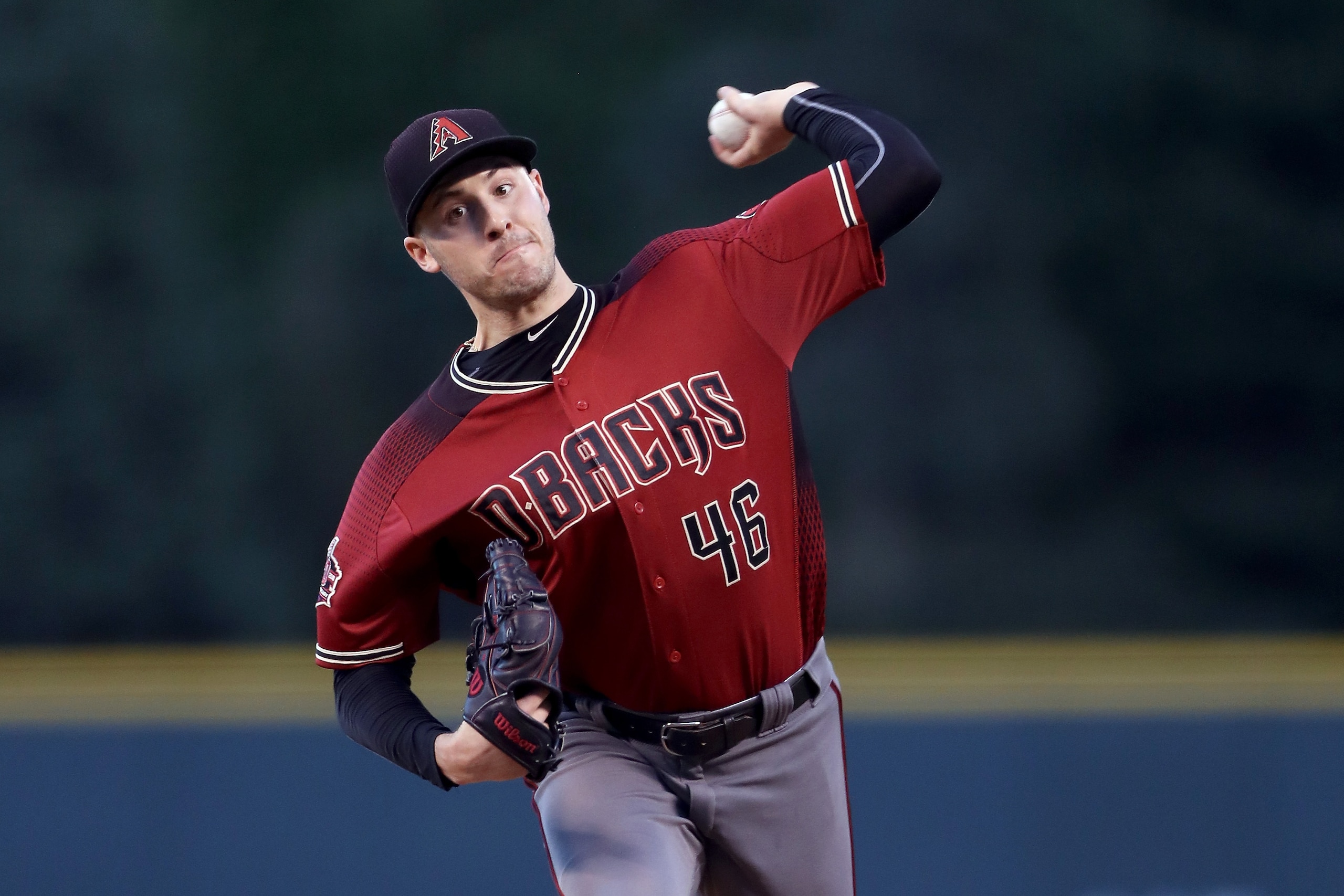 DENVER, CO - SEPTEMBER 12:  Starting pitcher Patrick Corbin #46 of the Arizona Diamondbacks throws in the first inning against the Colorado Rockies at Coors Field on September 12, 2018 in Denver, Colorado.  (Photo by Matthew Stockman/Getty Images)