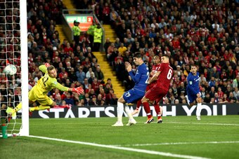 LIVERPOOL, ENGLAND - SEPTEMBER 26:  Eden Hazard of Chelsea scores his sides second goal during the Carabao Cup Third Round match between Liverpool and Chelsea at Anfield on September 26, 2018 in Liverpool, England.  (Photo by Jan Kruger/Getty Images)