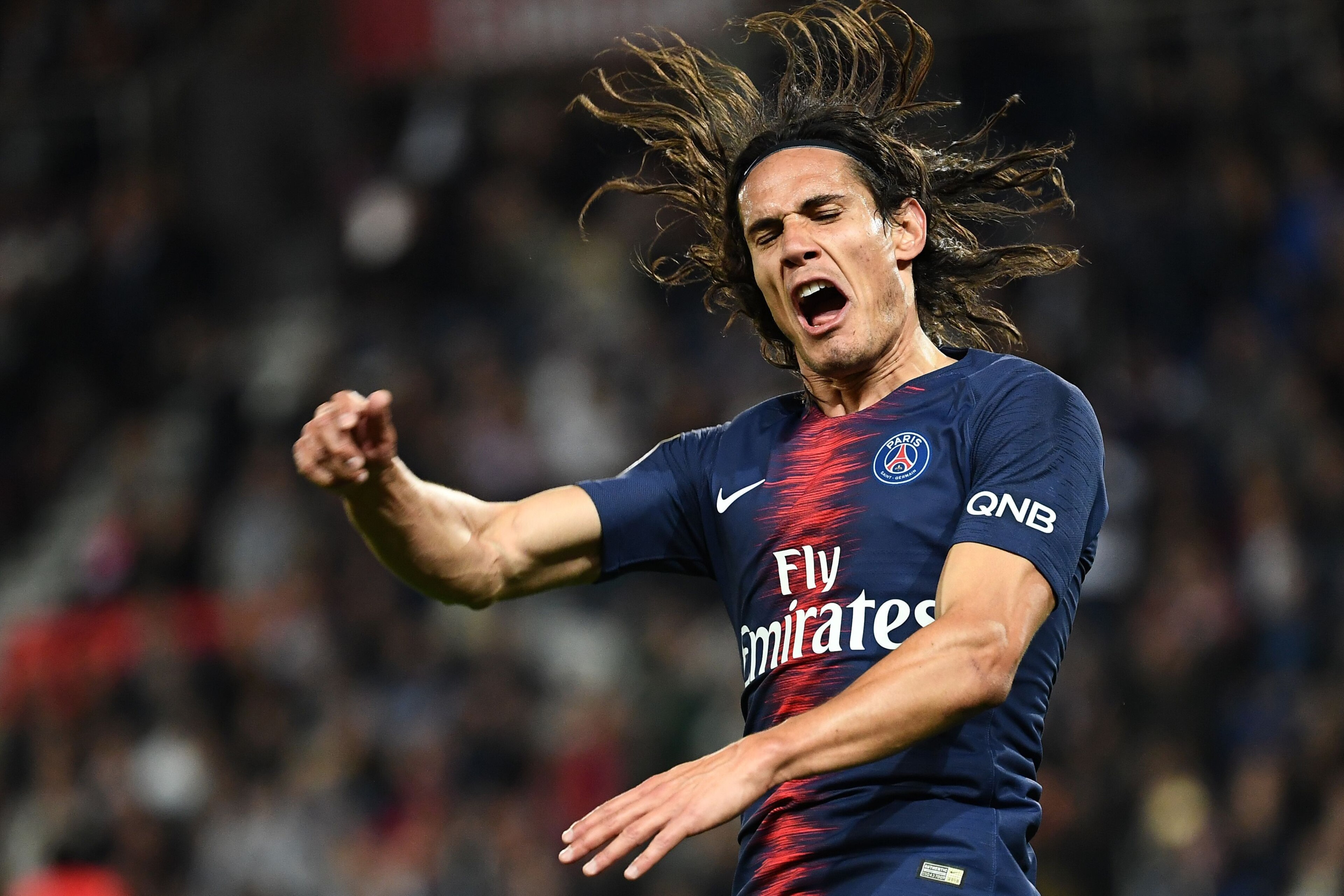 Paris Saint-Germain's Uruguayan forward Edinson Cavani reacts after missing a goal opportunity during the French L1 football match between Paris Saint Germain and Reims, on September 26, 2018 at the Parc des Princes stadium in Paris. (Photo by Anne-Christ