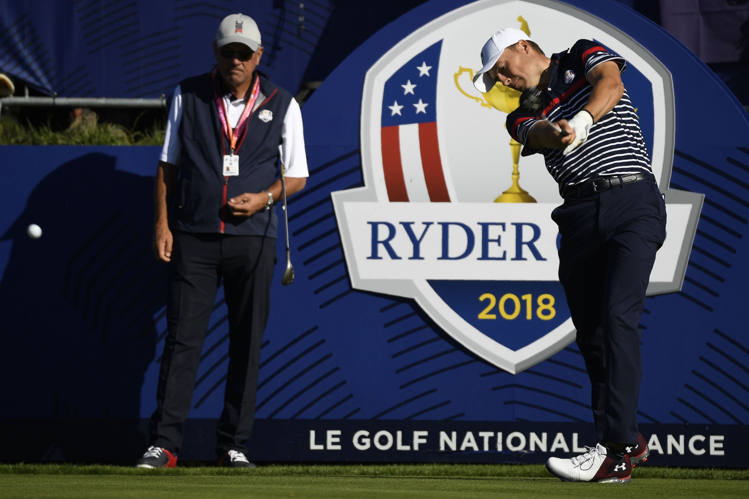 US golfer Jordan Spieth plays a tee shot during a practice session ahead of the 42nd Ryder Cup at Le Golf National Course at Saint-Quentin-en-Yvelines, south-west of Paris on September 27, 2018. (Photo by Eric FEFERBERG / AFP)        (Photo credit should 