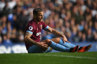 LIVERPOOL, ENGLAND - SEPTEMBER 16:  Marko Arnautovic of  West Ham looks on from the floor during the Premier League match between Everton FC and West Ham United at Goodison Park on September 16, 2018 in Liverpool, United Kingdom.  (Photo by Stu Forster/Ge