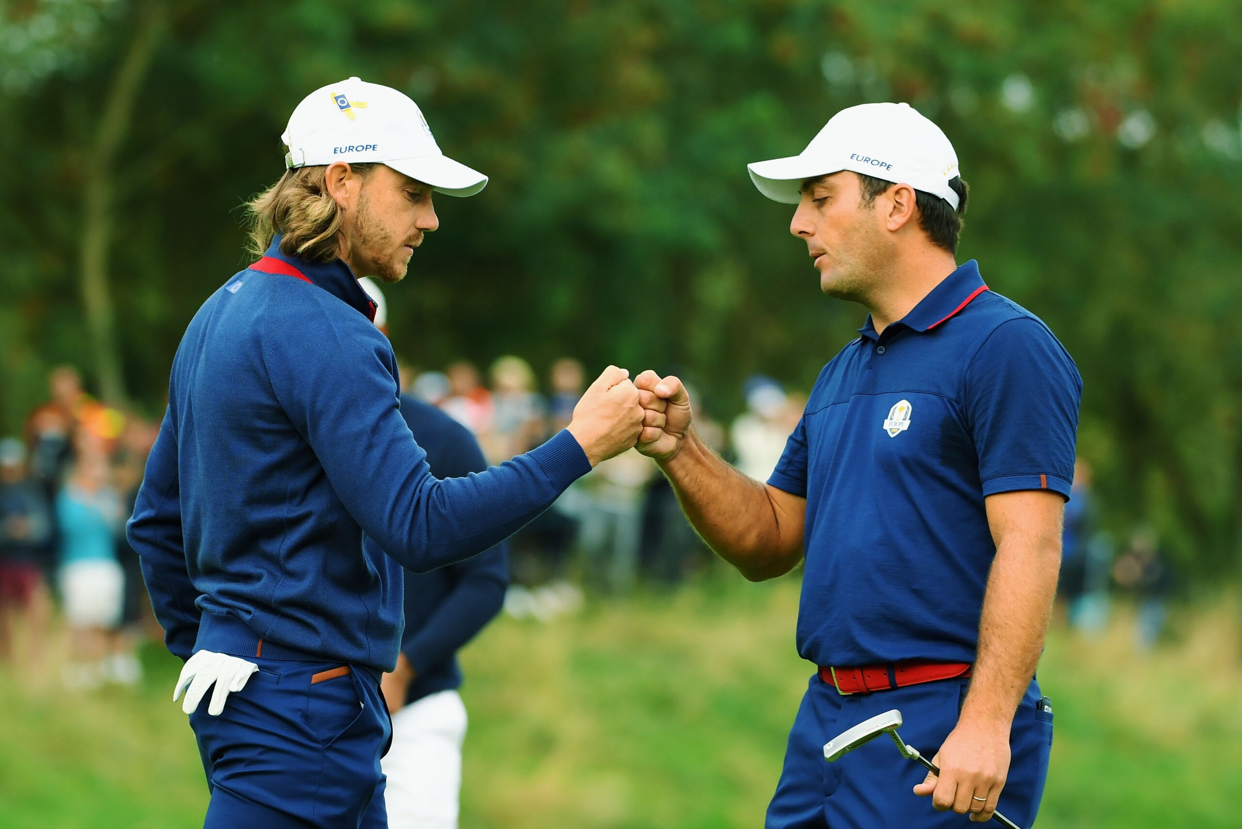 PARIS, FRANCE - SEPTEMBER 28: Francesco Molinari of Europe and Tommy Fleetwood of Europe celebrate during the morning fourball matches of the 2018 Ryder Cup at Le Golf National on September 28, 2018 in Paris, France.  (Photo by Ross Kinnaird/Getty Images)