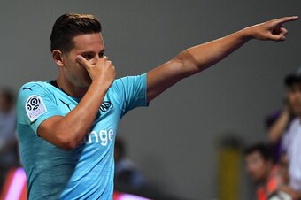 Olympique Marseille's French midfielder Florian Thauvin reacts after scoring a goal during the French L1 football match between Nimes and Marseille at The Costières Stadium in Nimes, southern France on August 19, 2018. (Photo by PASCAL GUYOT / AFP)       