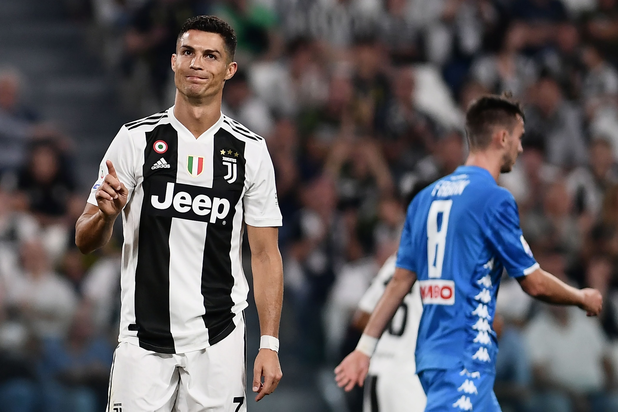 Juventus' Portuguese forward Cristiano Ronaldo gestures during the Italian Serie A football match Juventus vs Napoli on September 29, 2018 at the Juventus stadium in Turin. (Photo by Marco BERTORELLO / AFP)        (Photo credit should read MARCO BERTORELL