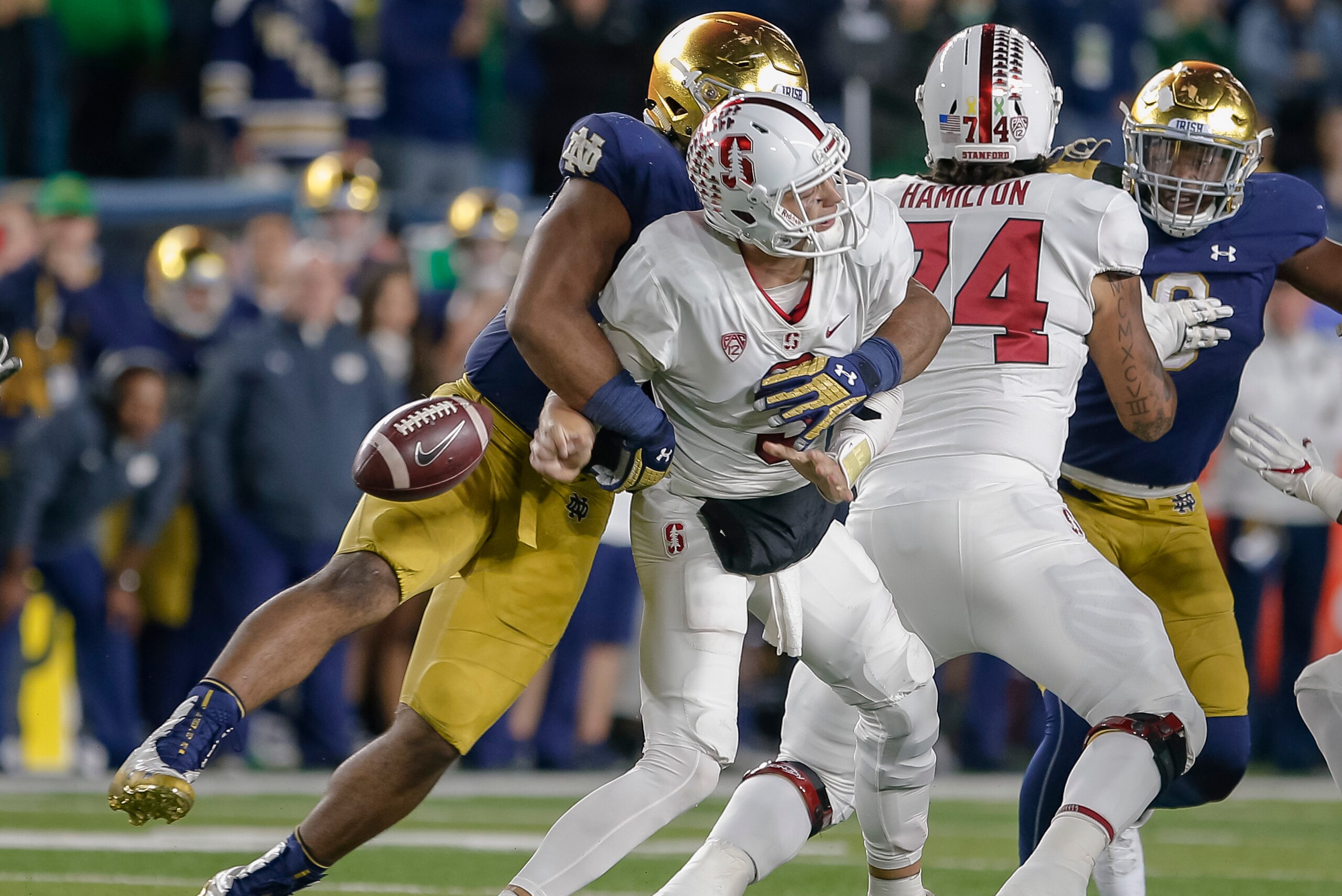 SOUTH BEND, IN - SEPTEMBER 29: K.J. Costello #3 of the Stanford Cardinal is sacked by Jerry Tillery #99 of the Notre Dame Fighting Irish during the game at Notre Dame Stadium on September 29, 2018 in South Bend, Indiana. (Photo by Michael Hickey/Getty Ima SOUTH BEND, IN - SEPTEMBER 29: K.J. Costello #3 of the Stanford Cardinal is sacked by Jerry Tillery #99 of the Notre Dame Fighting Irish during the game at Notre Dame Stadium on September 29, 2018 in South Bend, Indiana. (Photo by Michael Hickey/Getty Ima