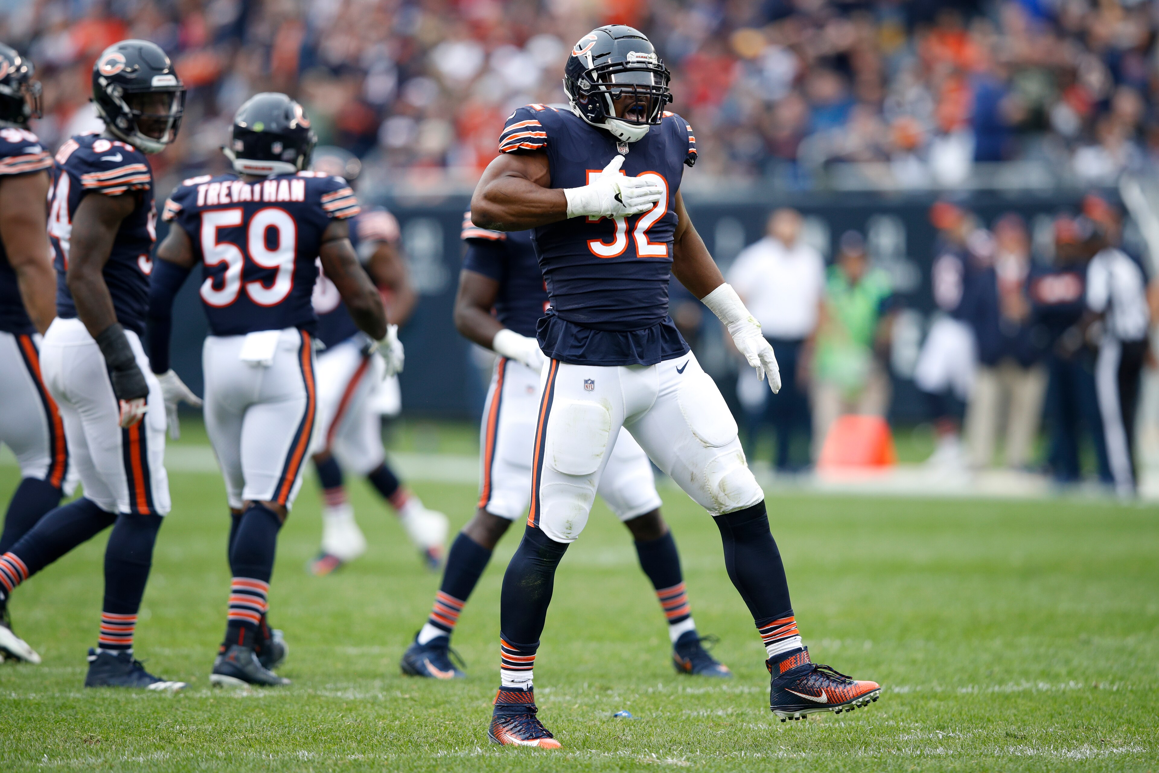 CHICAGO, IL - SEPTEMBER 30:  Khalil Mack #52 of the Chicago Bears celebrates after stripping the football in the second quarter against the Tampa Bay Buccaneers at Soldier Field on September 30, 2018 in Chicago, Illinois.  (Photo by Joe Robbins/Getty Imag