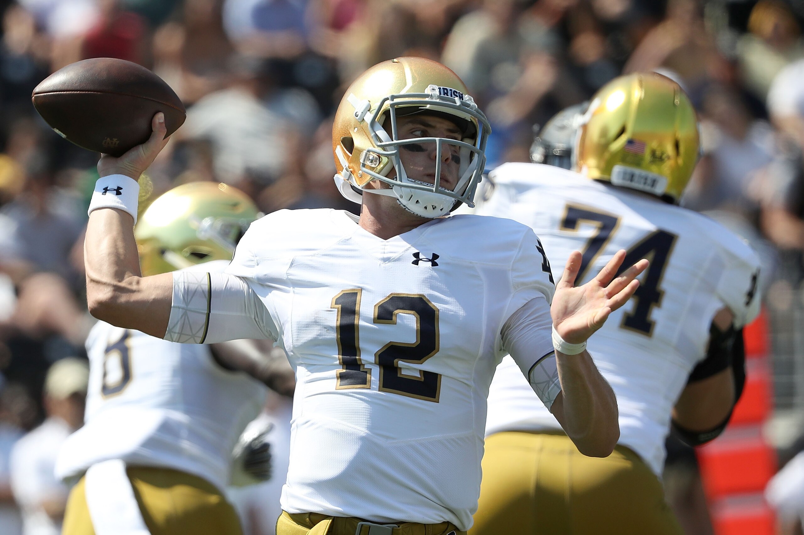WINSTON SALEM, NC - SEPTEMBER 22:  Ian Book #12 of the Notre Dame Fighting Irish drops back to pass against the Wake Forest Demon Deacons during their game at BB&T Field on September 22, 2018 in Winston Salem, North Carolina.  (Photo by Streeter Lecka/Get