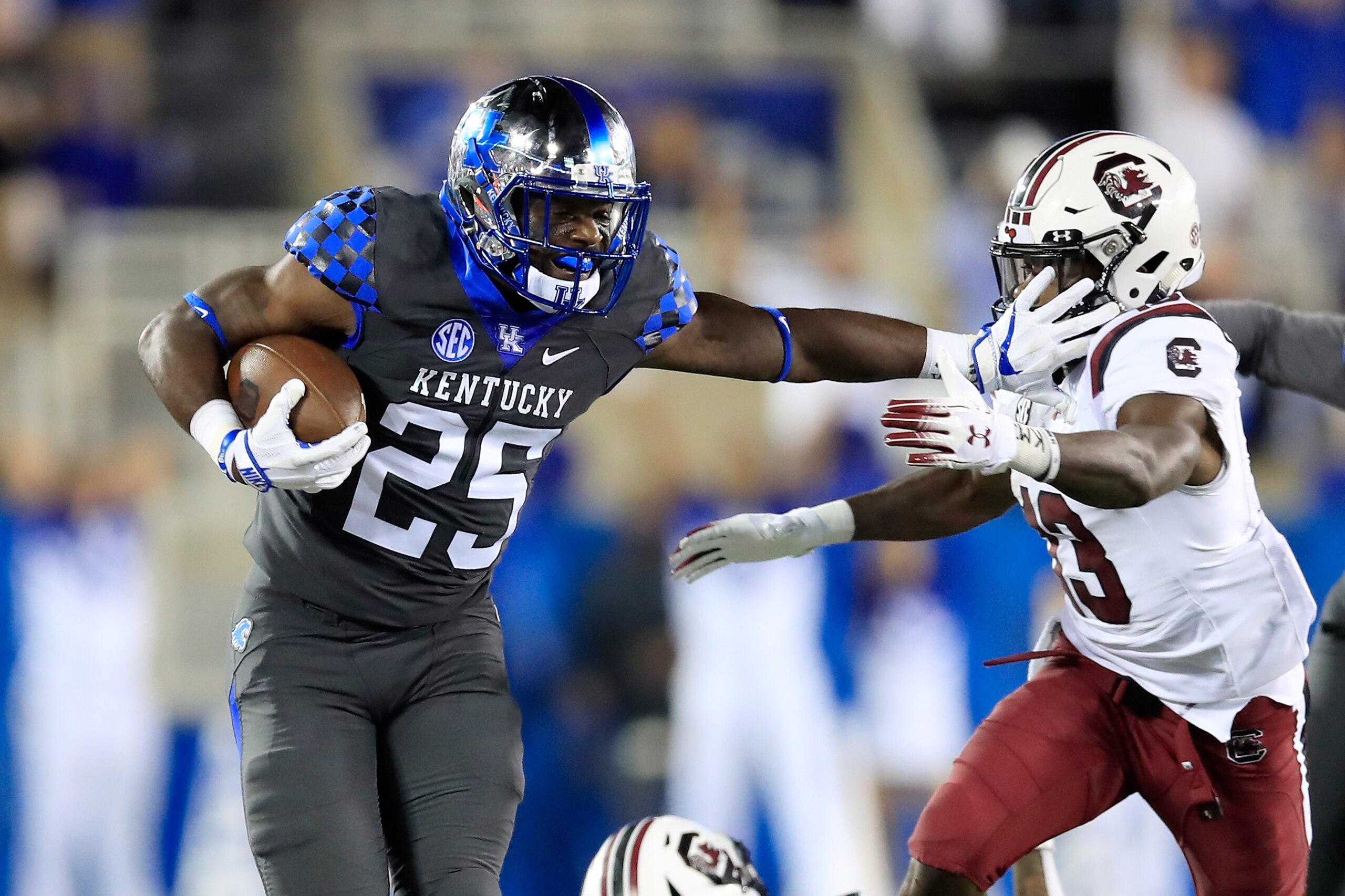 LEXINGTON, KY - SEPTEMBER 29:  Darius West #25  of the Kentucky Wildcats runs with the ball after intercepting a pass against the South Carolina Gamecocks at Commonwealth Stadium on September 29, 2018 in Lexington, Kentucky.  (Photo by Andy Lyons/Getty Im